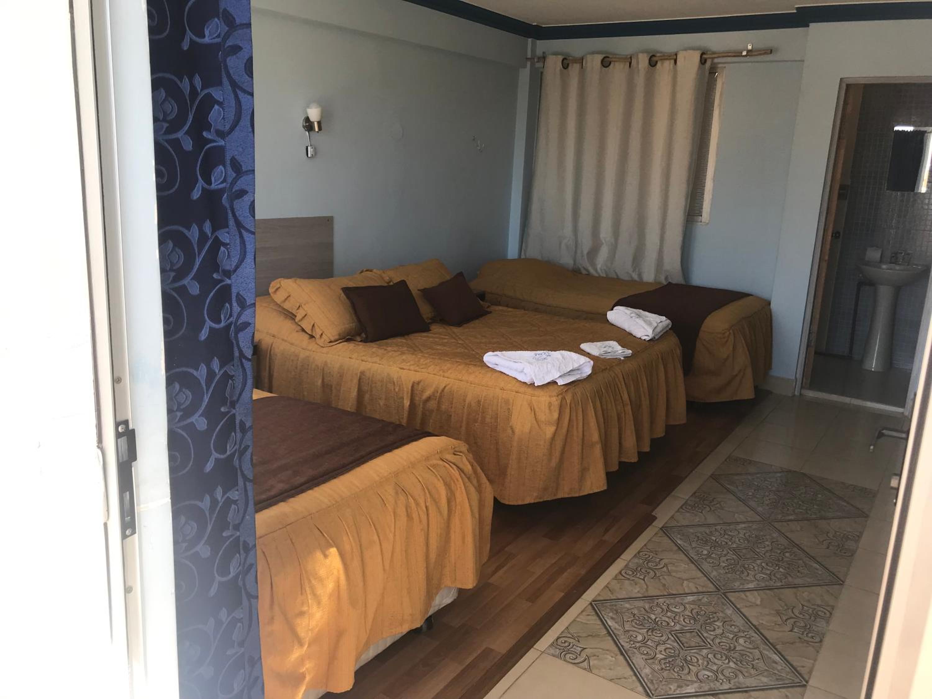 Quadruple Room with Private Bathroom photo 3