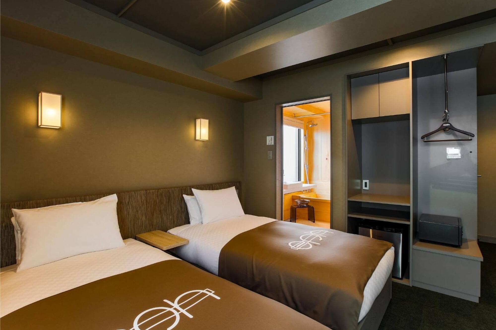 Twin Room - Photo 12