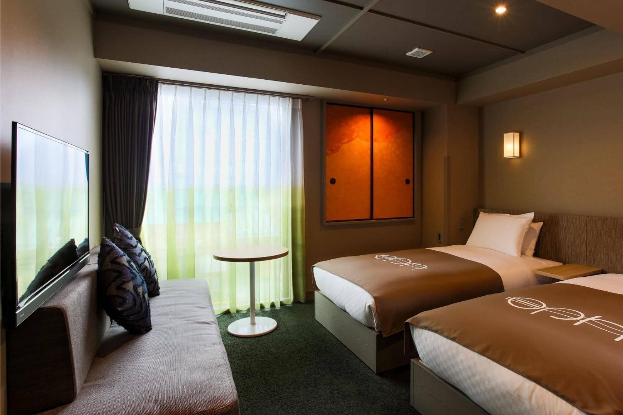 Twin Room - Photo 13