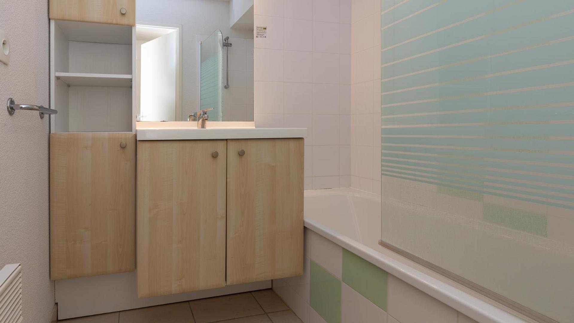 Three-Bedroom Apartment - Photo 6