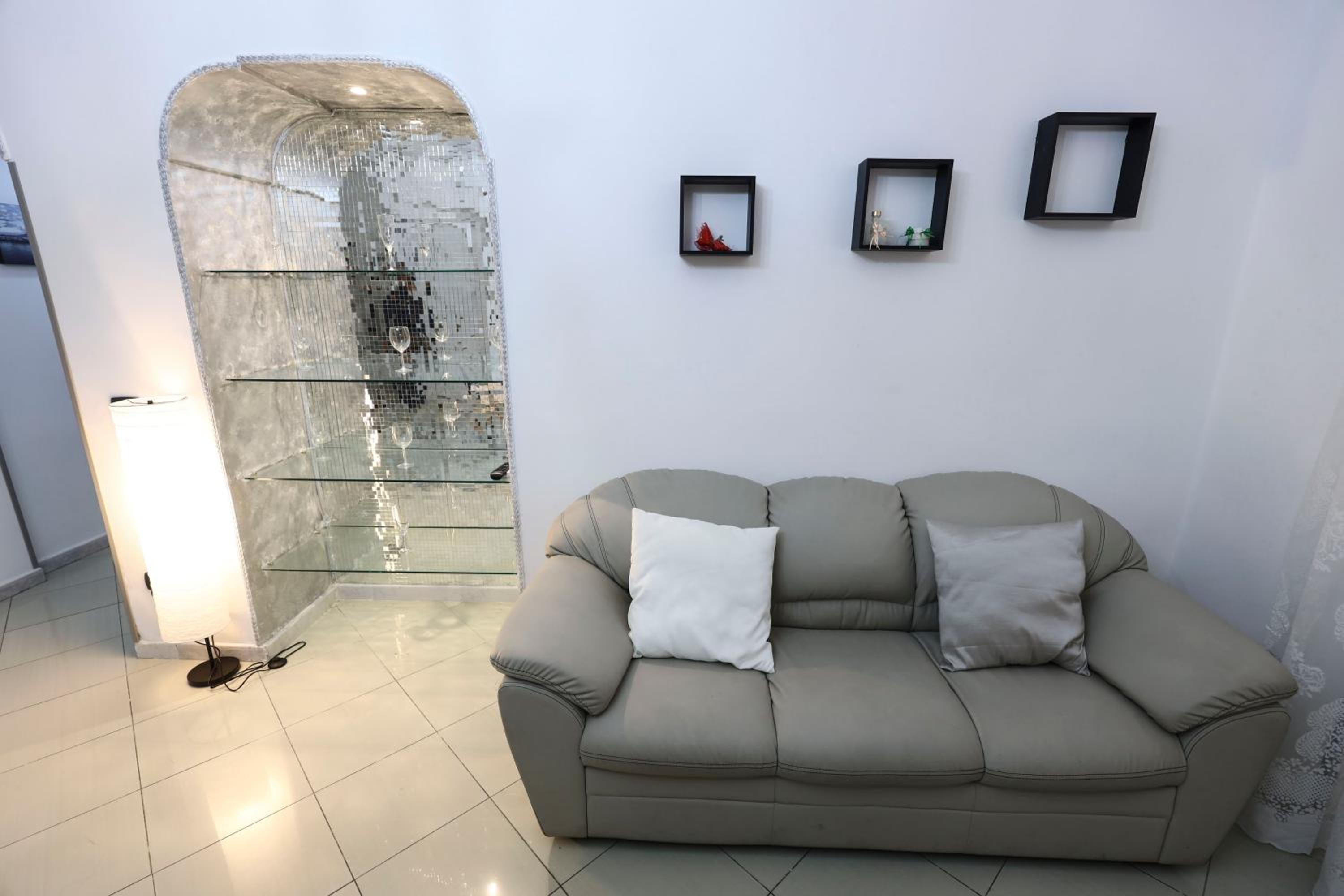 Four-Bedroom Apartment with Balcony 