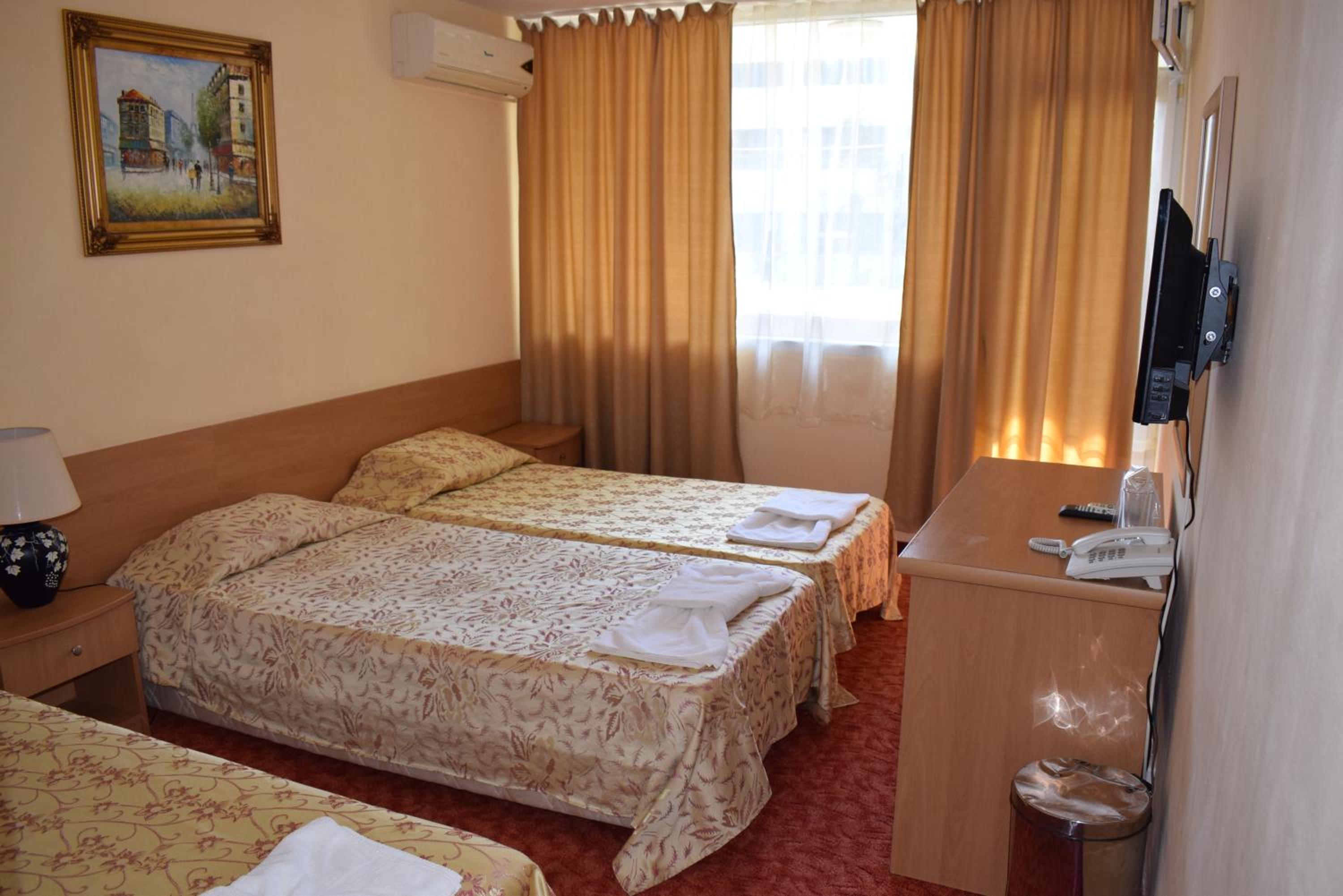 Economy Double Room with Balcony (2 Adults + 1 Child) photo 1
