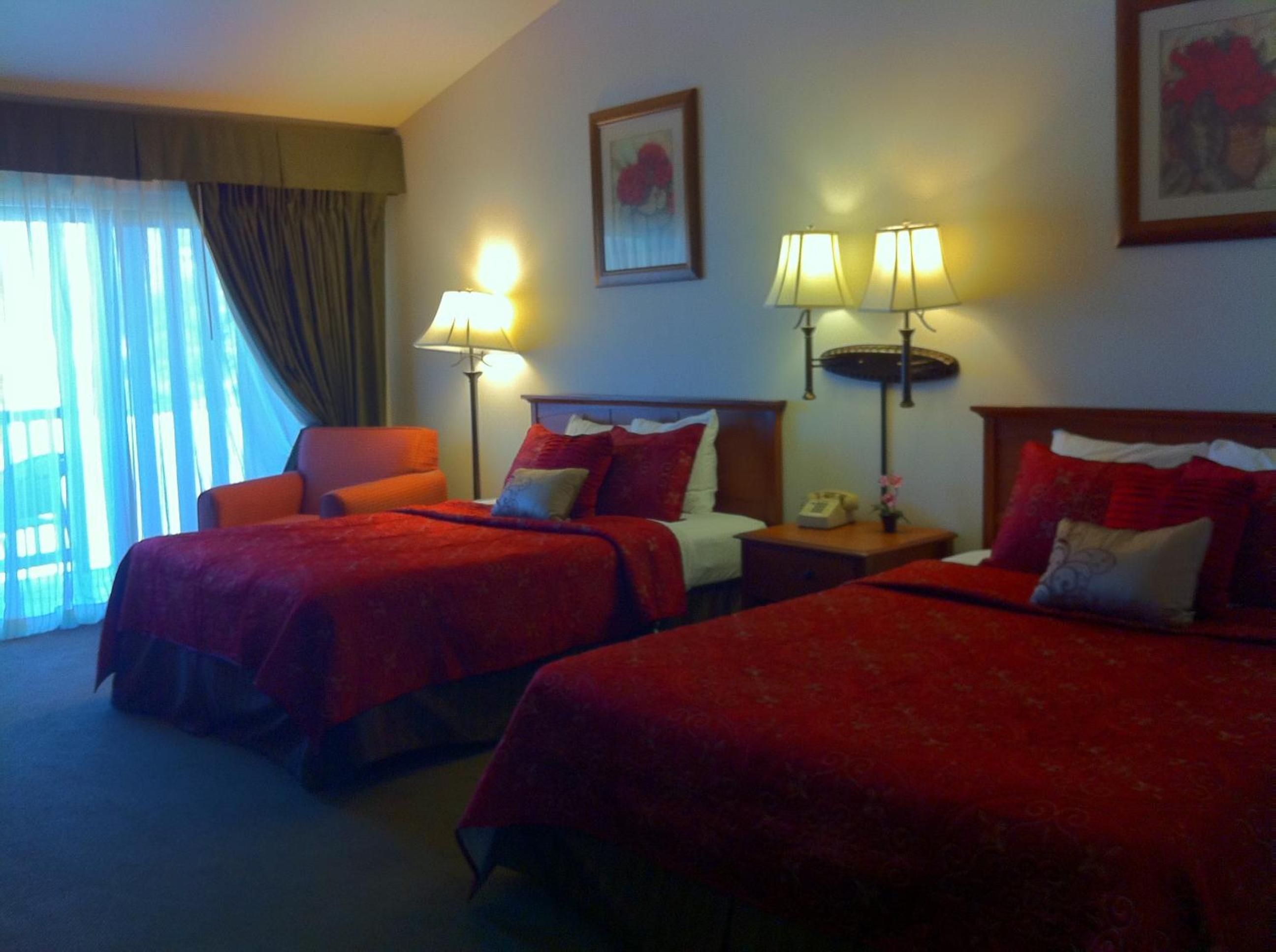 Deluxe Queen Room with Two Queen Beds - Photo 1