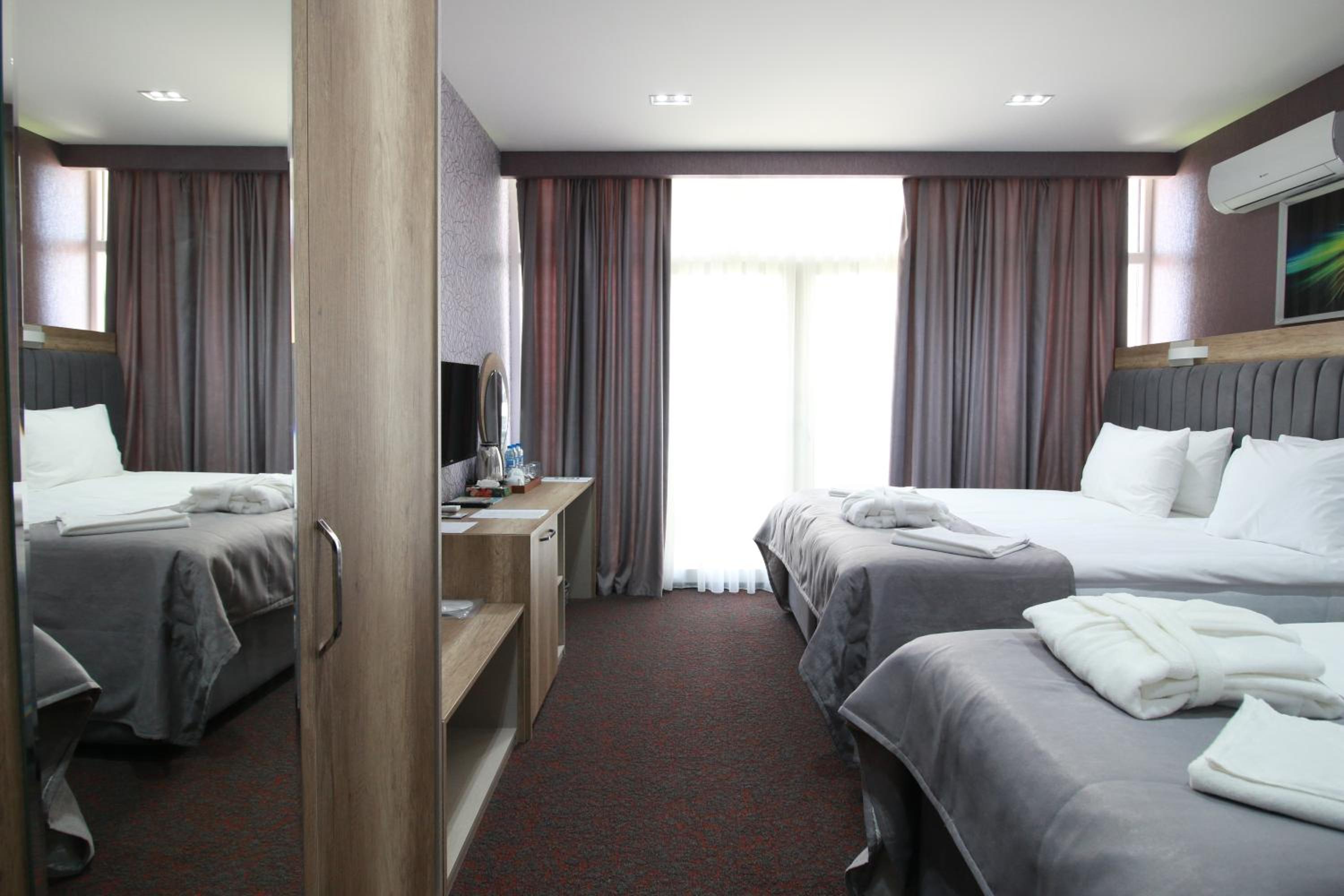 Superior Triple Room - Photo 11