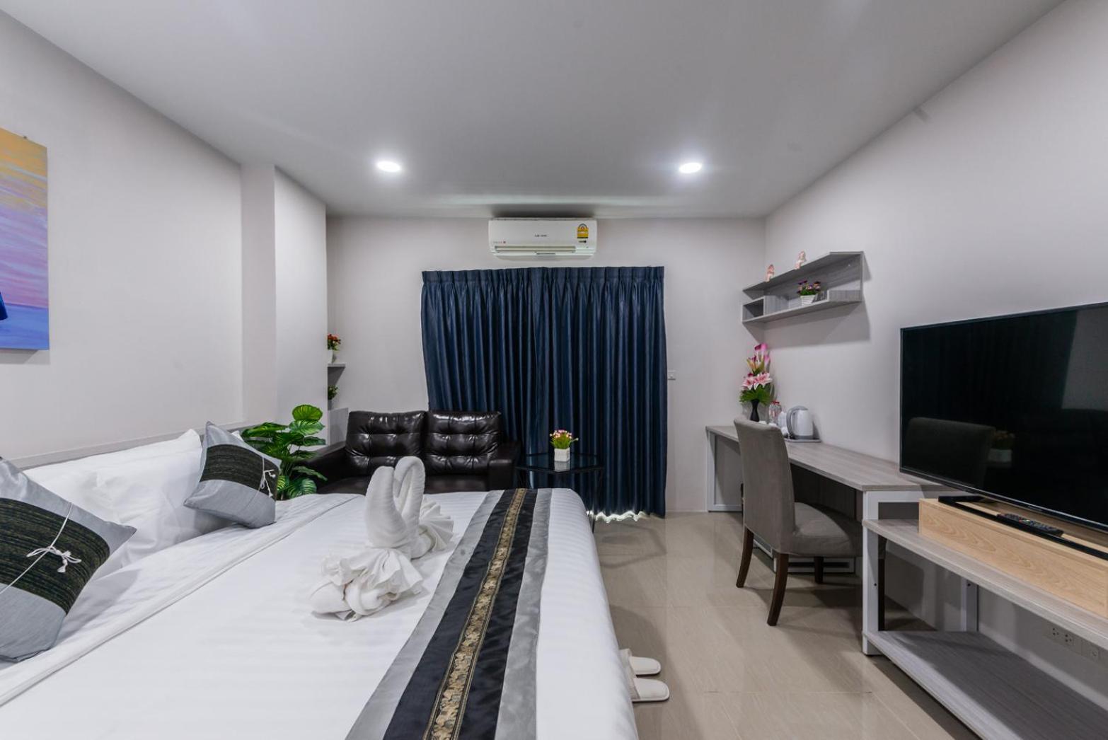 Deluxe Room - Photo 2
