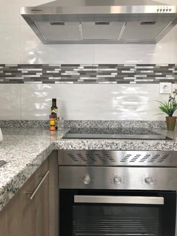 Three-Bedroom Apartment - Photo 12