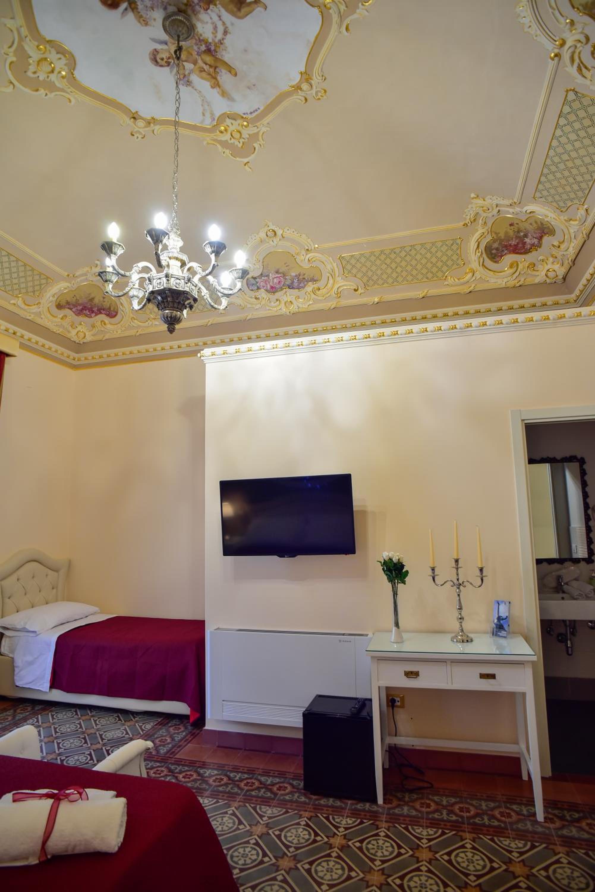 Luxury Quadruple Room - Photo 14