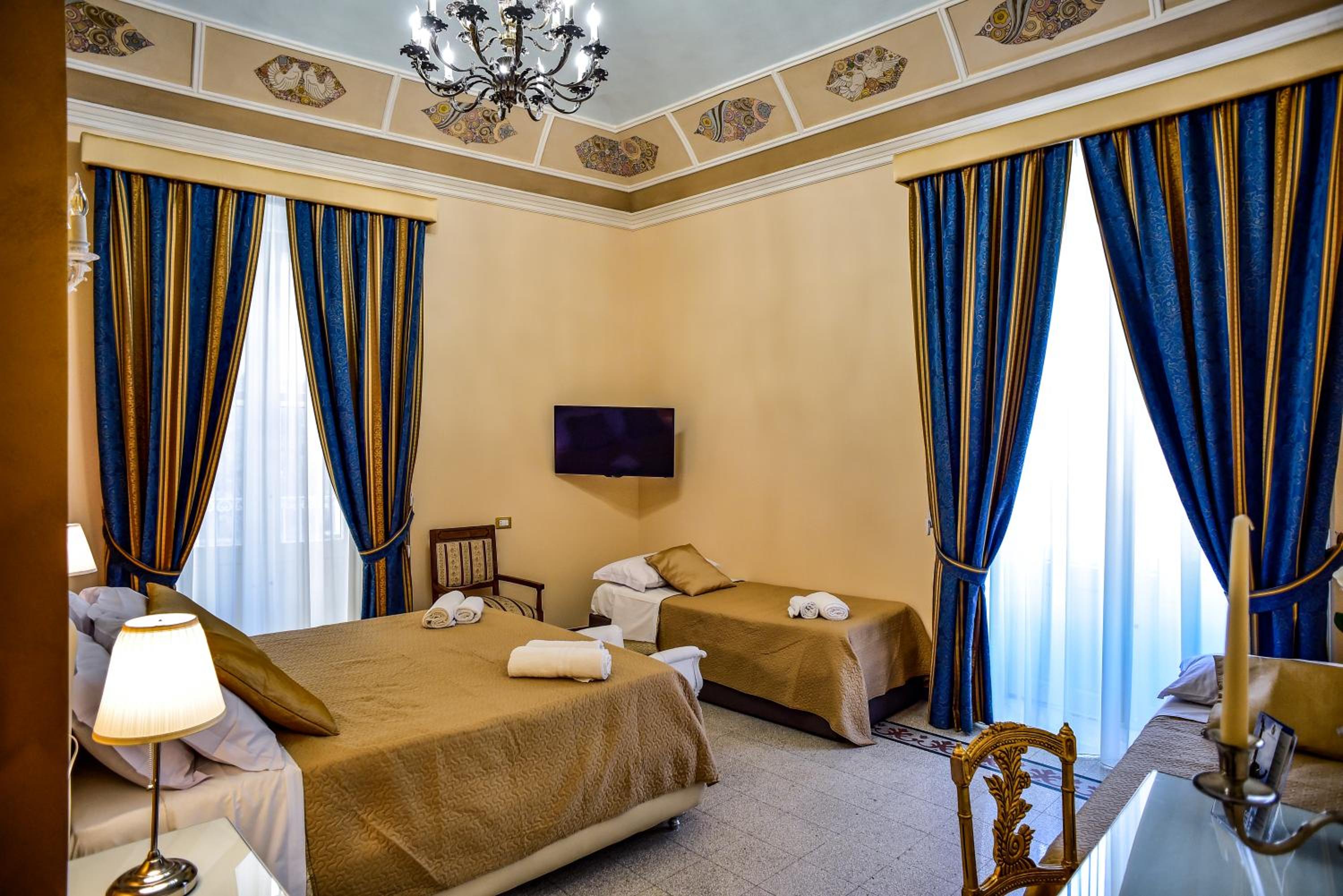 Deluxe Triple Room - Photo 10