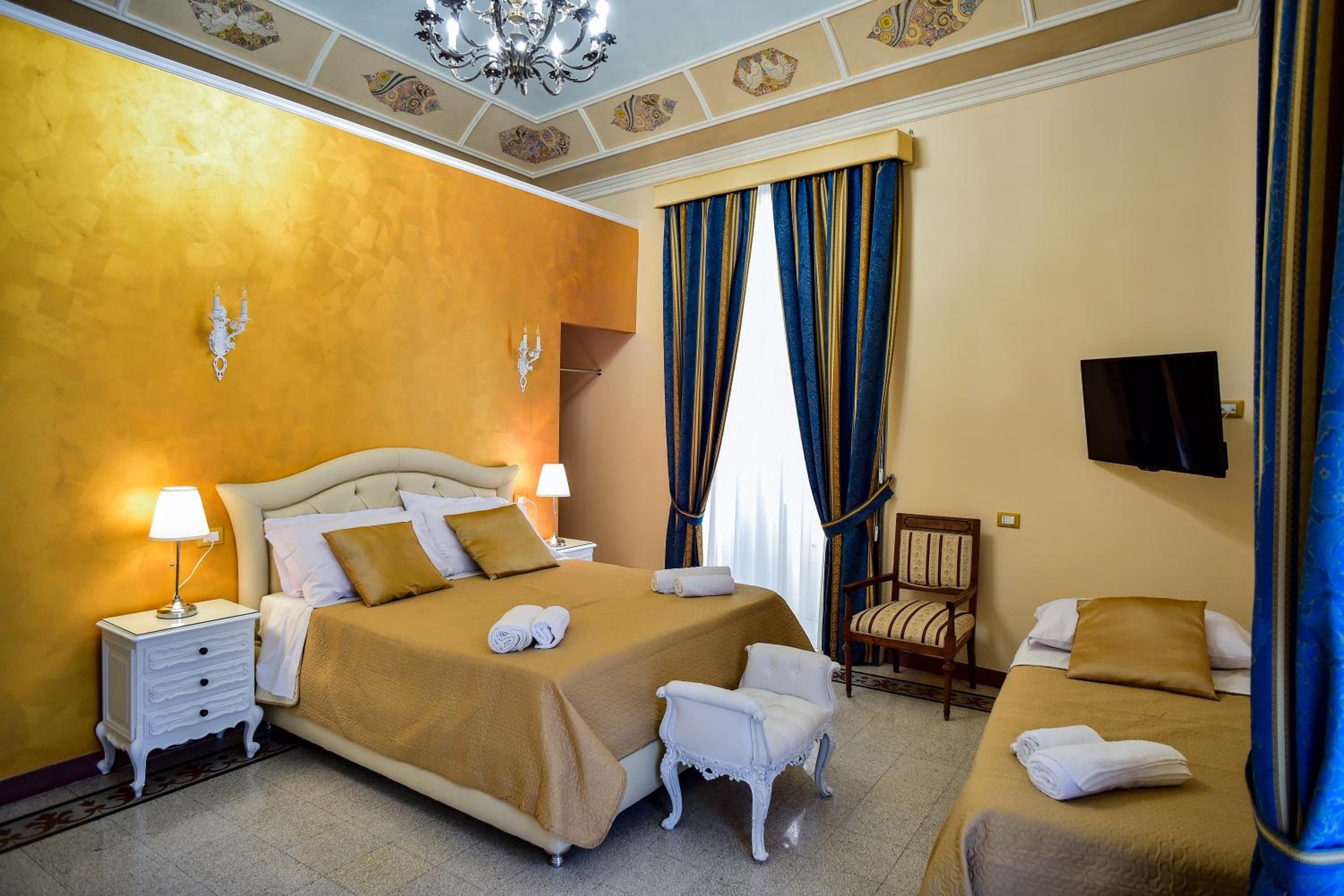 Deluxe Triple Room - Photo 13