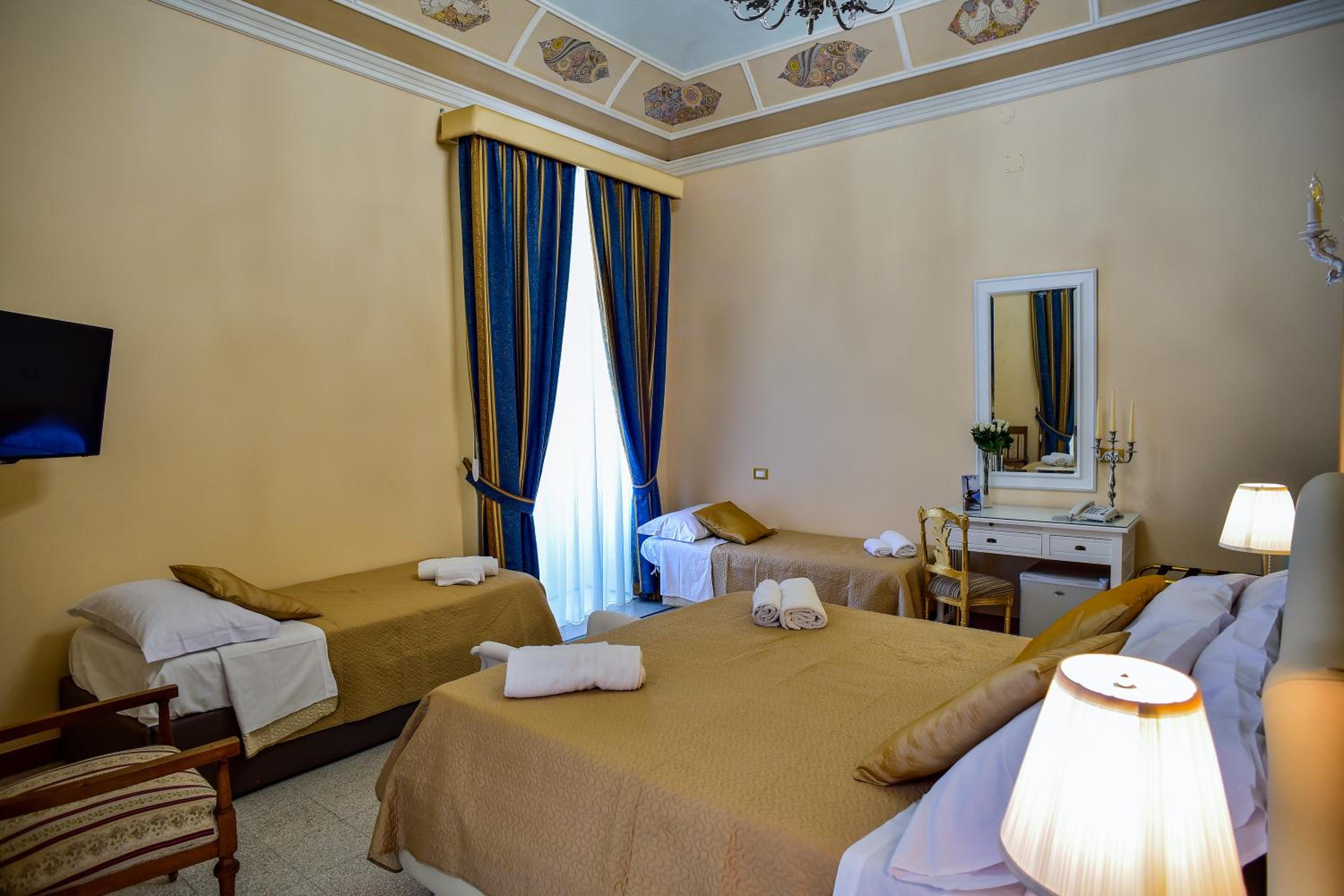 Deluxe Triple Room - Photo 14
