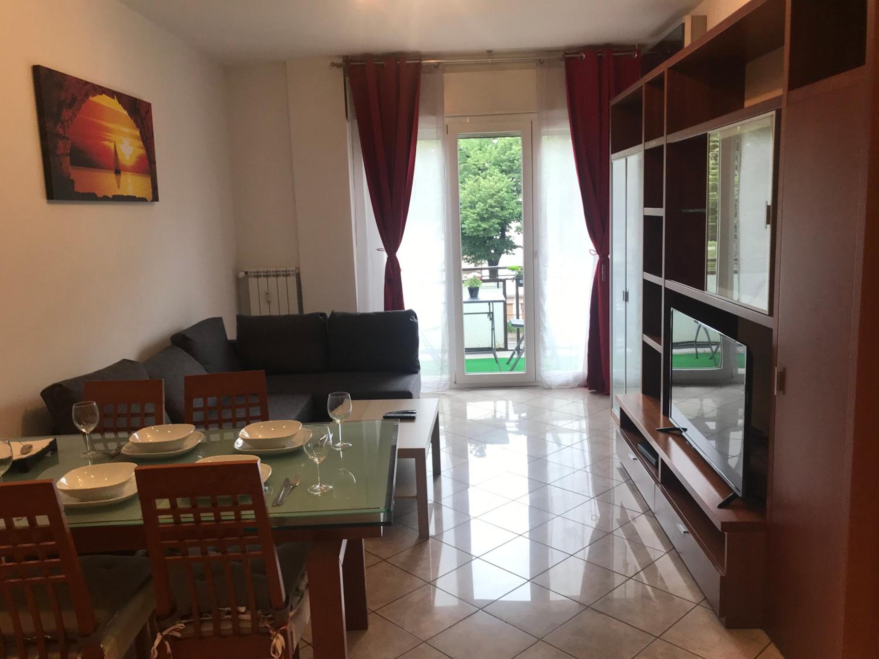 Apartment with Balcony - Photo 2