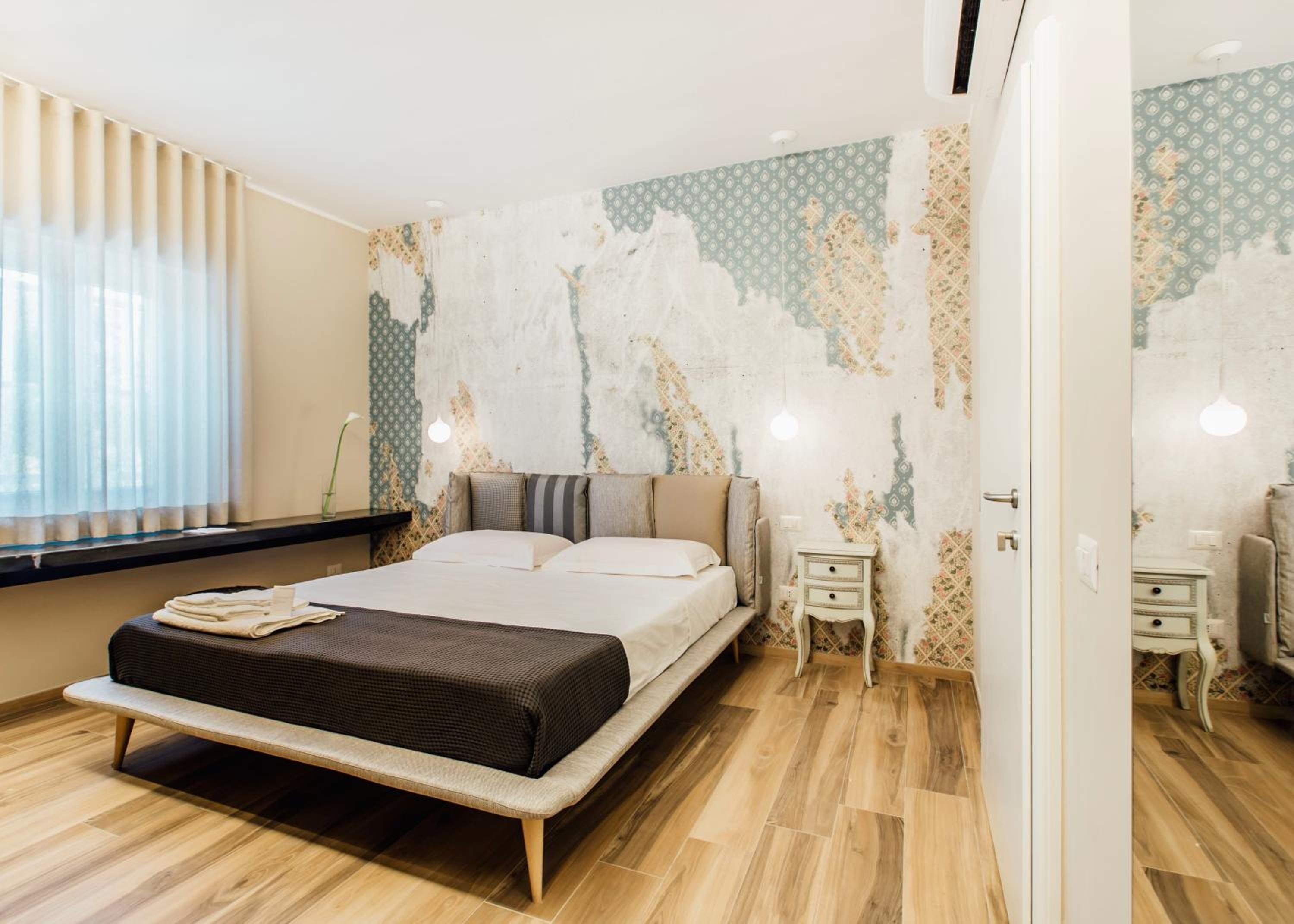 Deluxe Quadruple Room - Photo 10