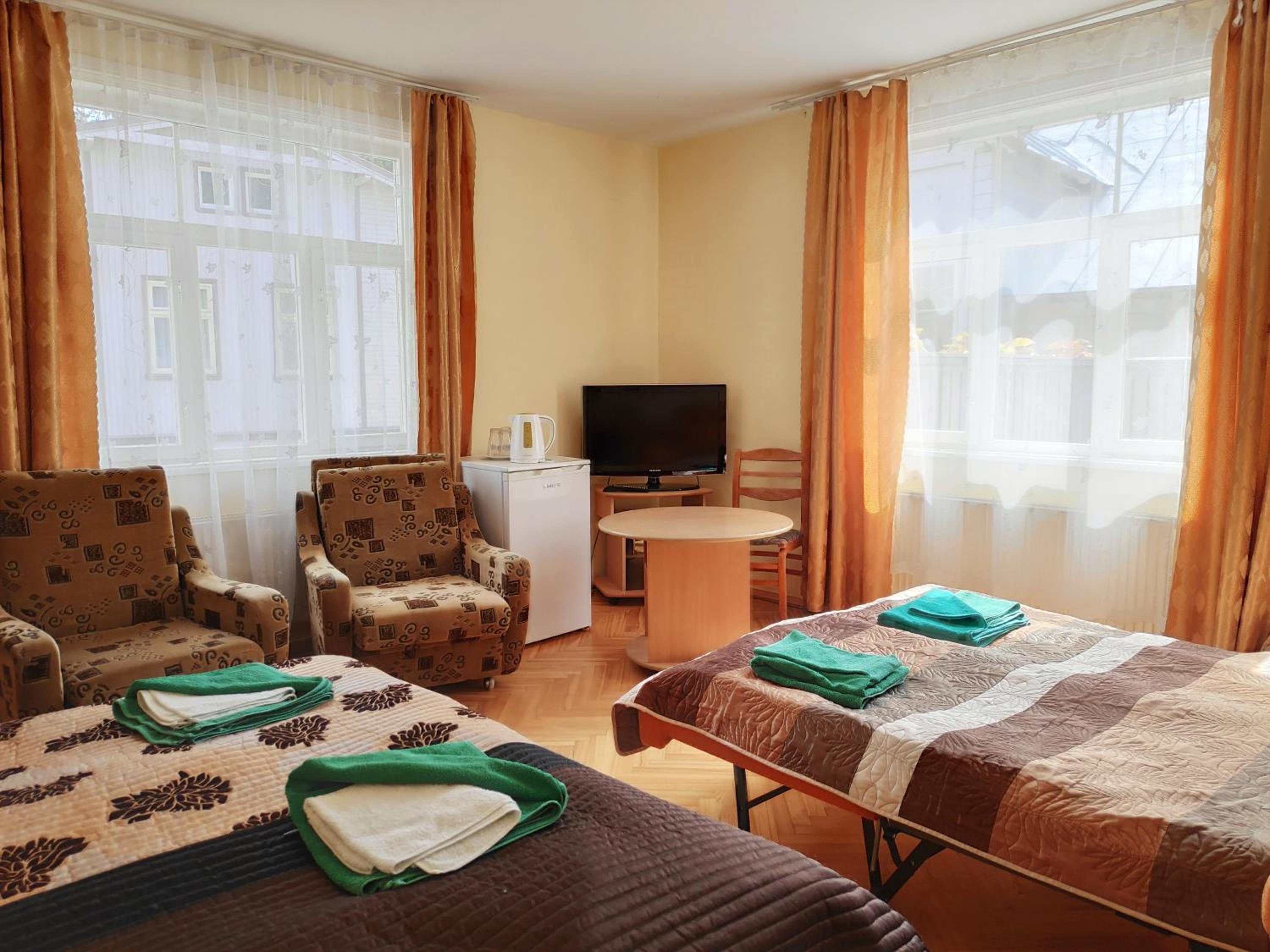 Quadruple Room with Balcony - Photo 1