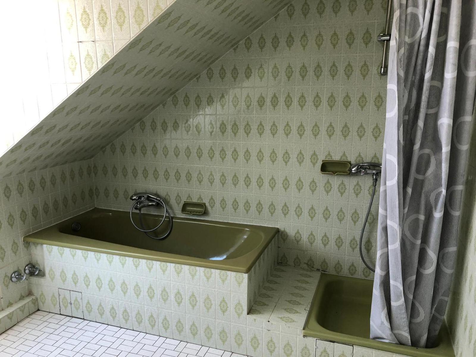 Three-Bedroom Apartment - Photo 10