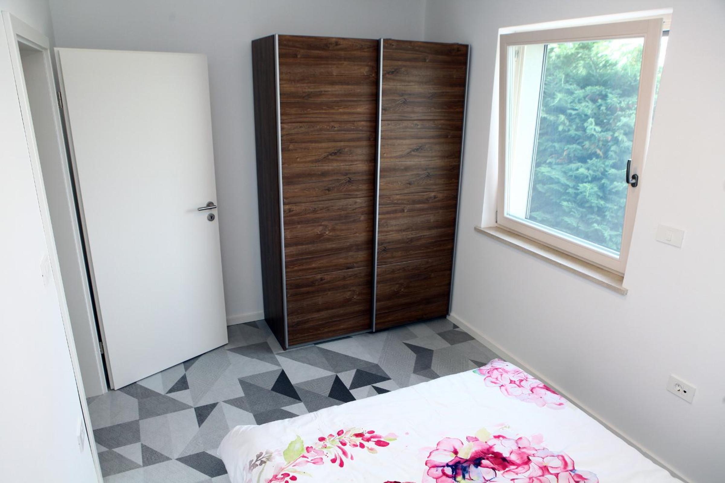 Two-Bedroom Apartment - Photo 11