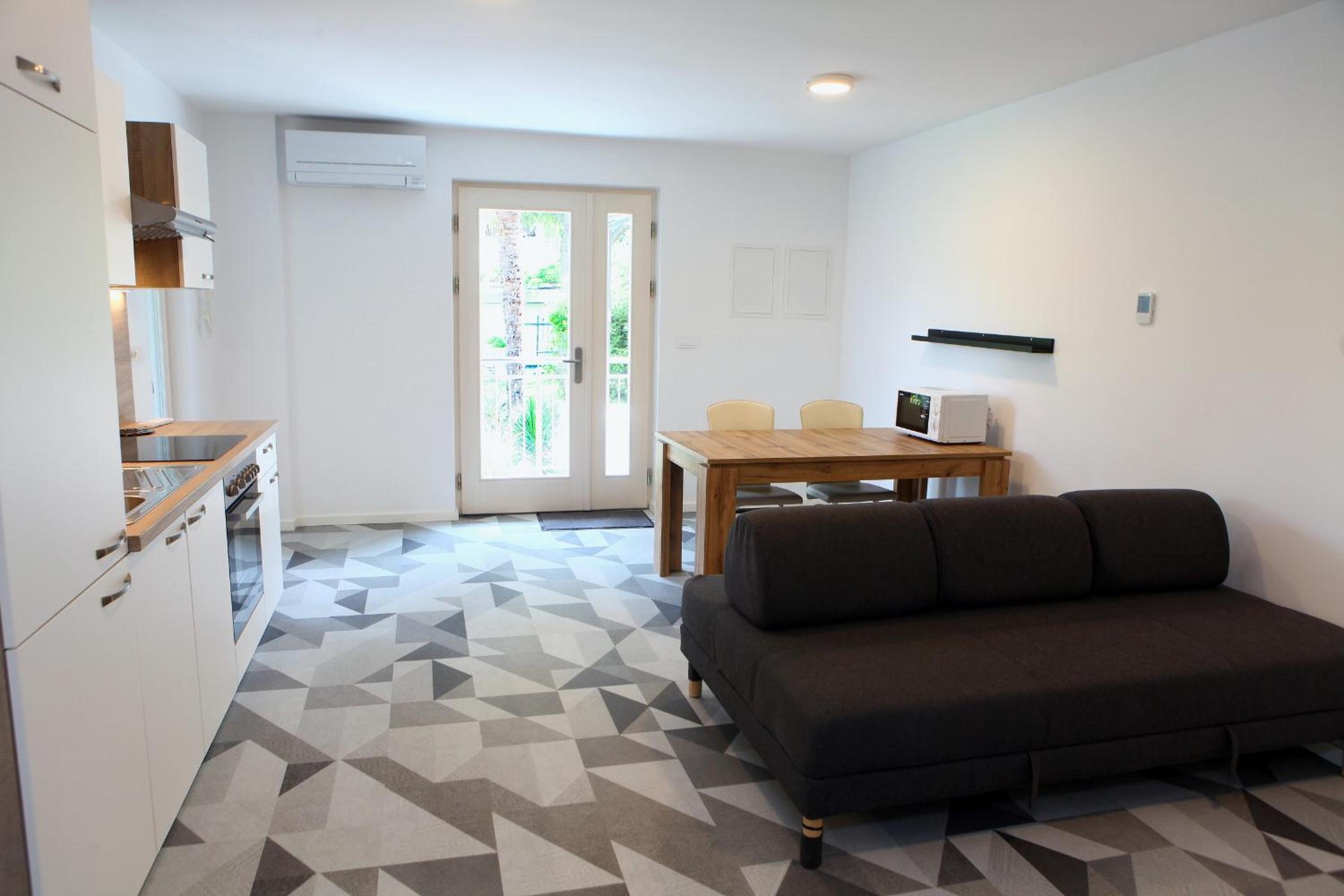 Two-Bedroom Apartment - Photo 14