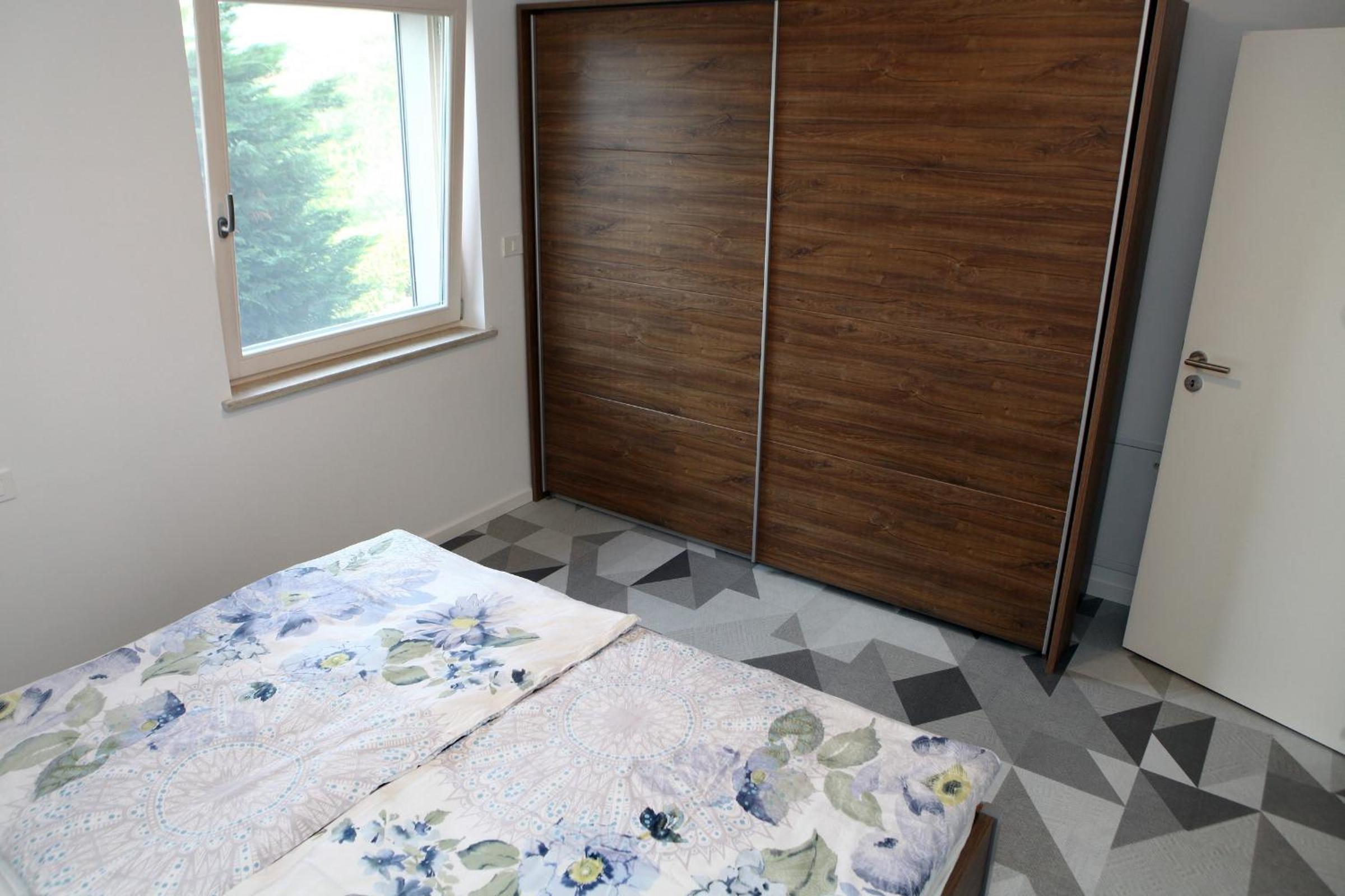 Two-Bedroom Apartment - Photo 22