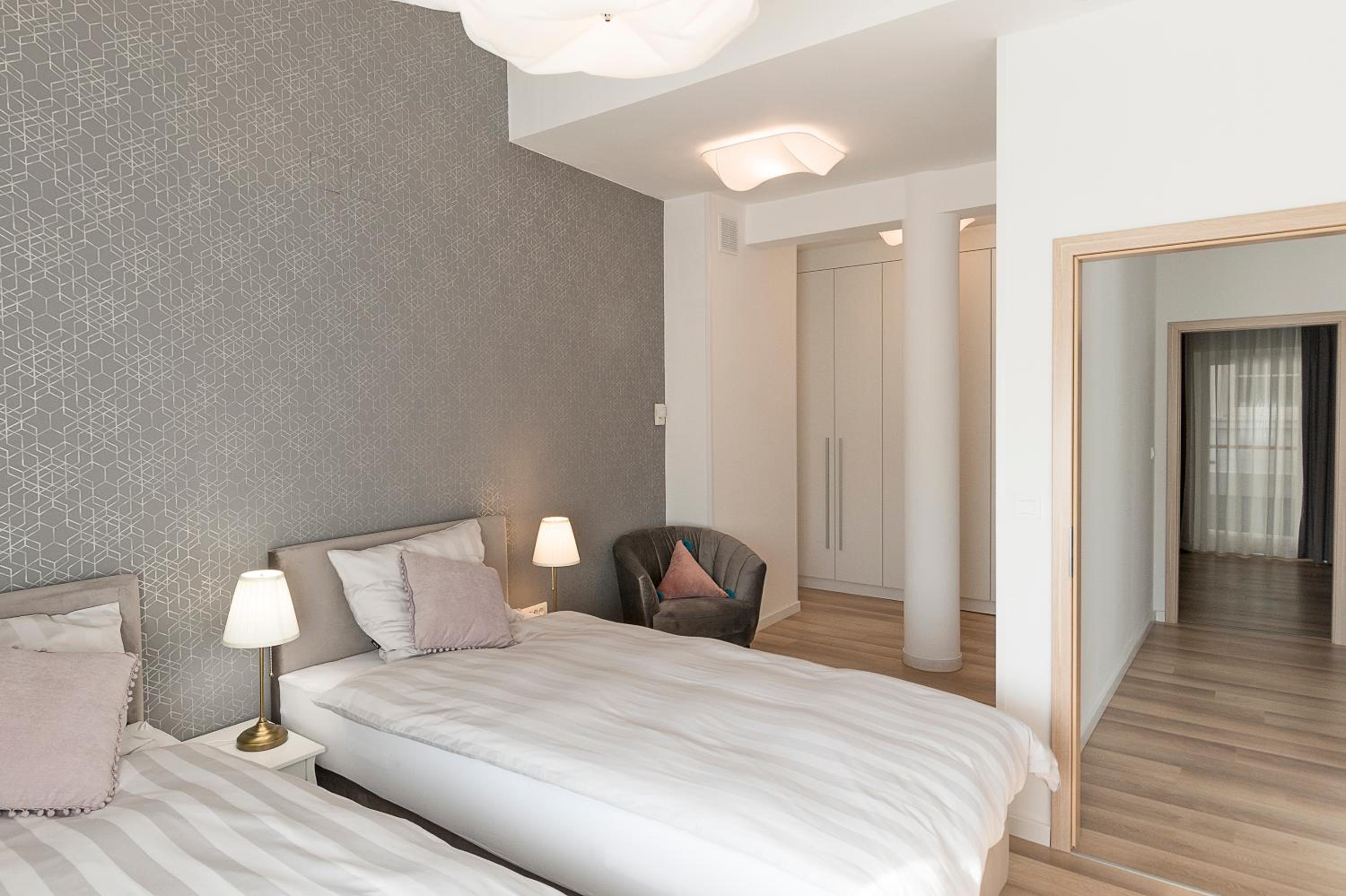 Three-Bedroom Apartment - Photo 27