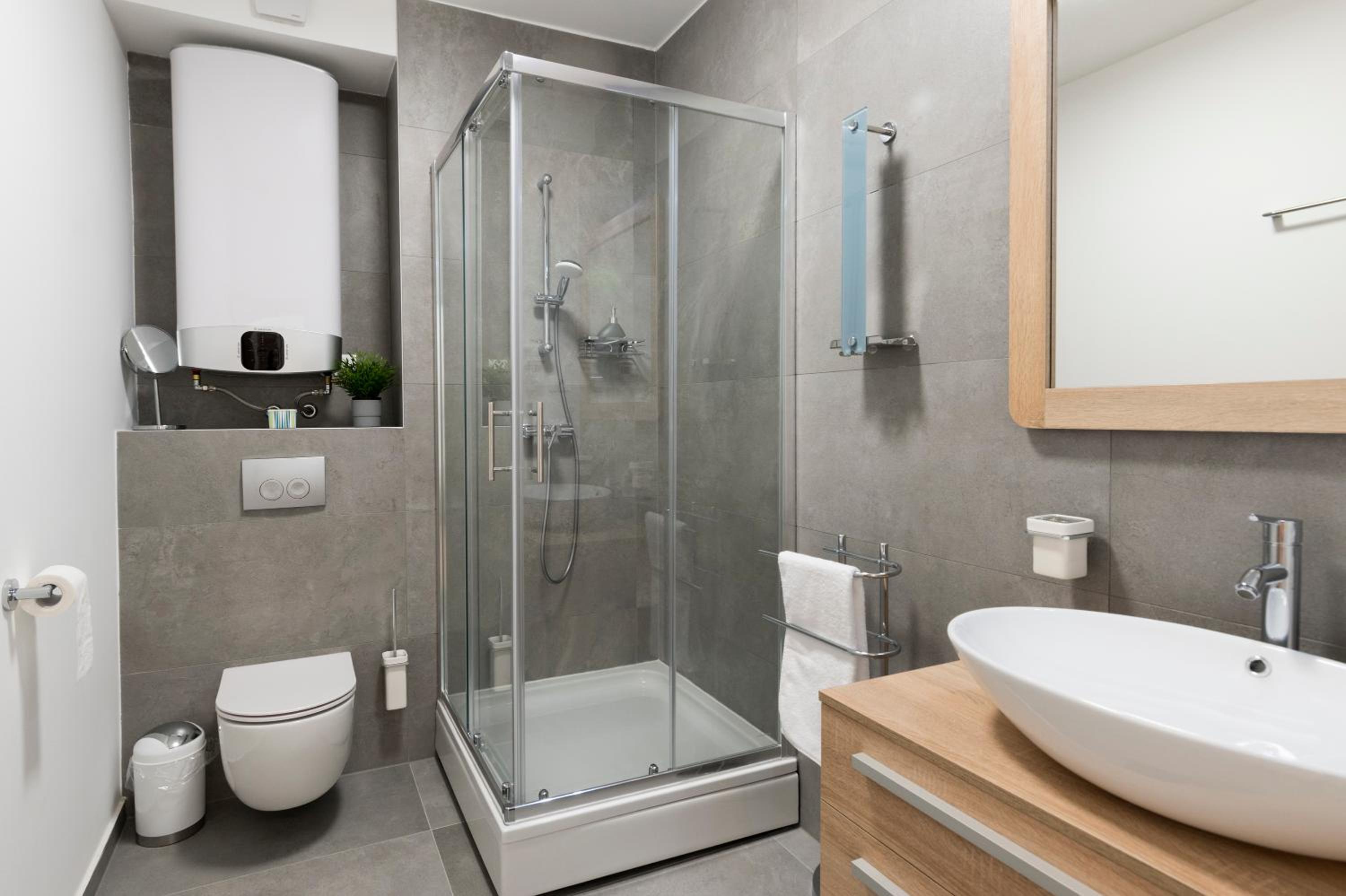 Three-Bedroom Apartment - Photo 32