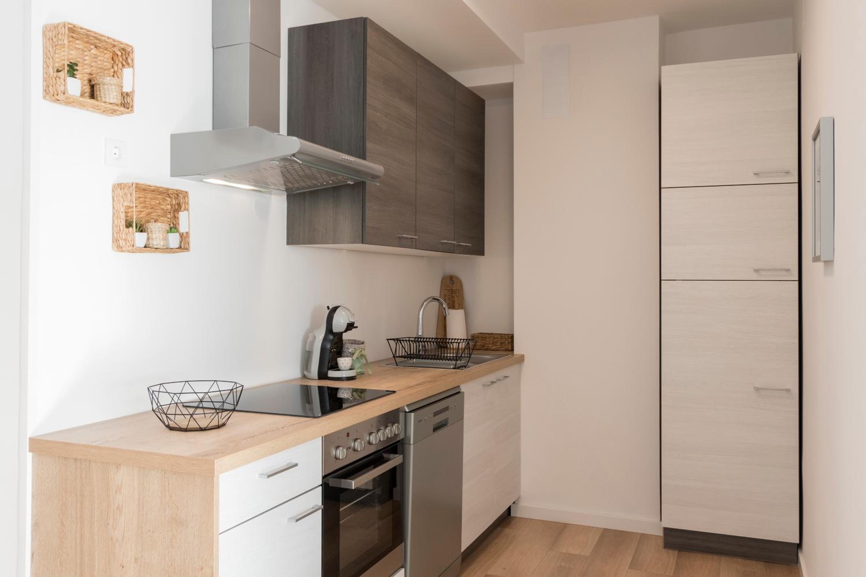 Three-Bedroom Apartment - Photo 10