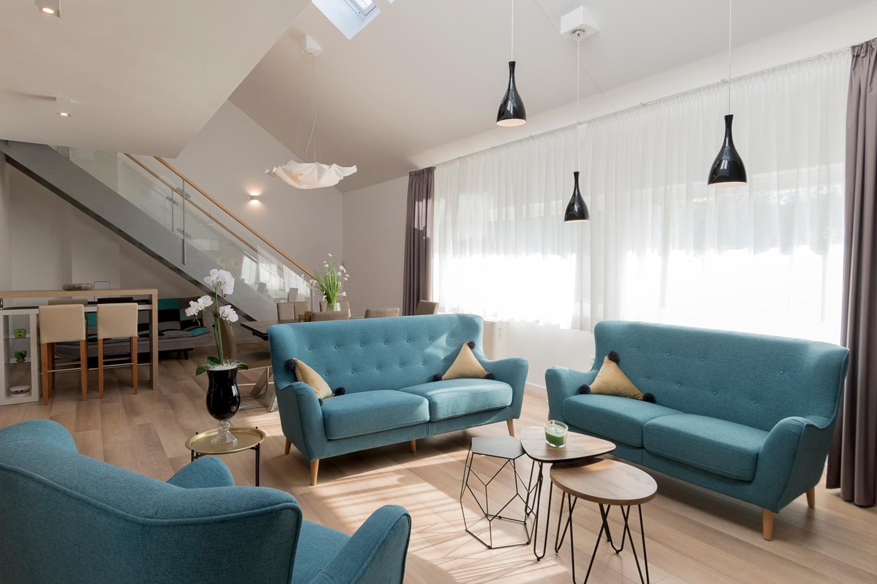 Three-Bedroom Apartment - Photo 2