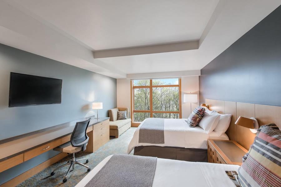 Deluxe Queen Room with Two Queen Beds - Photo 1