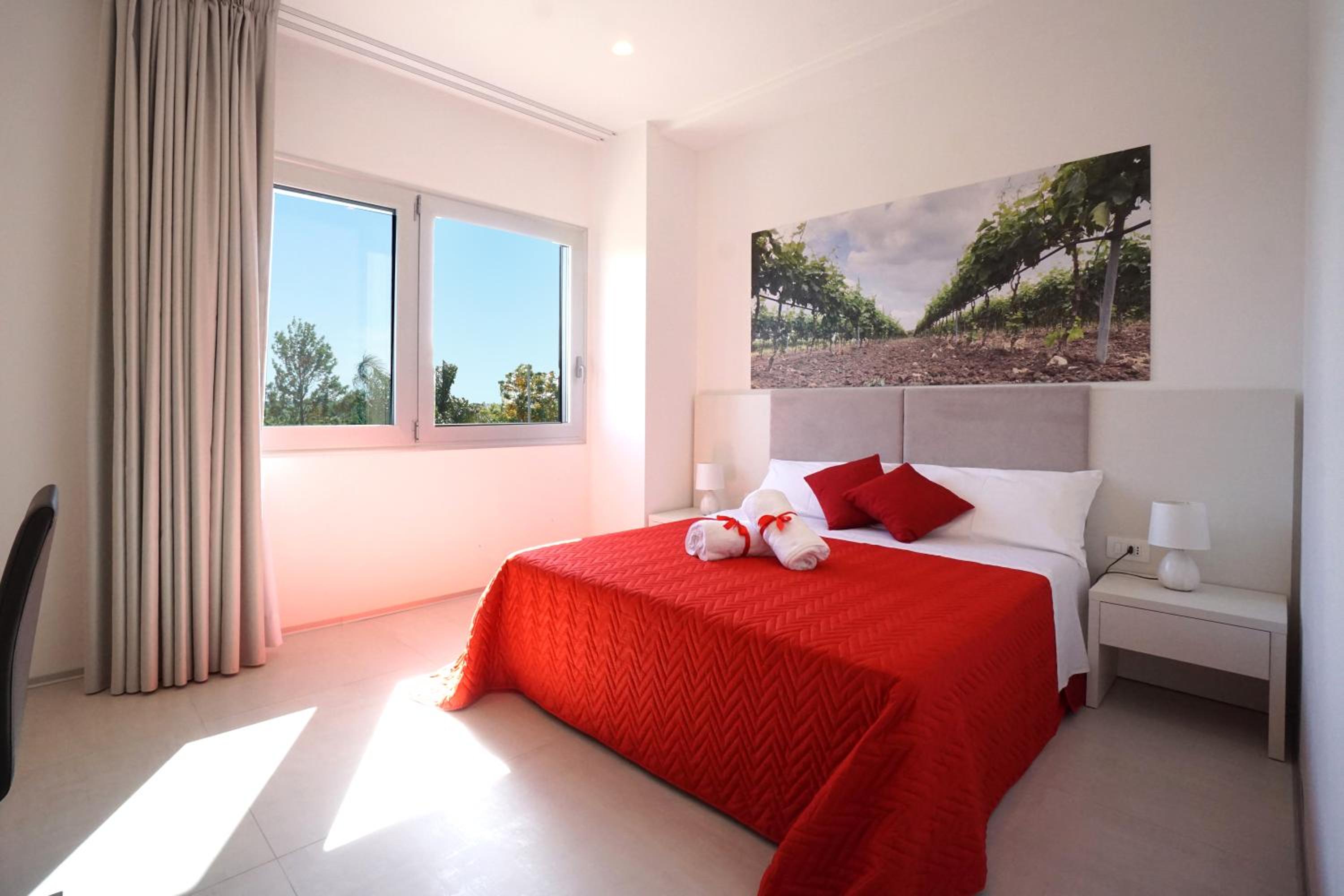 Deluxe Quadruple Room - Photo 12