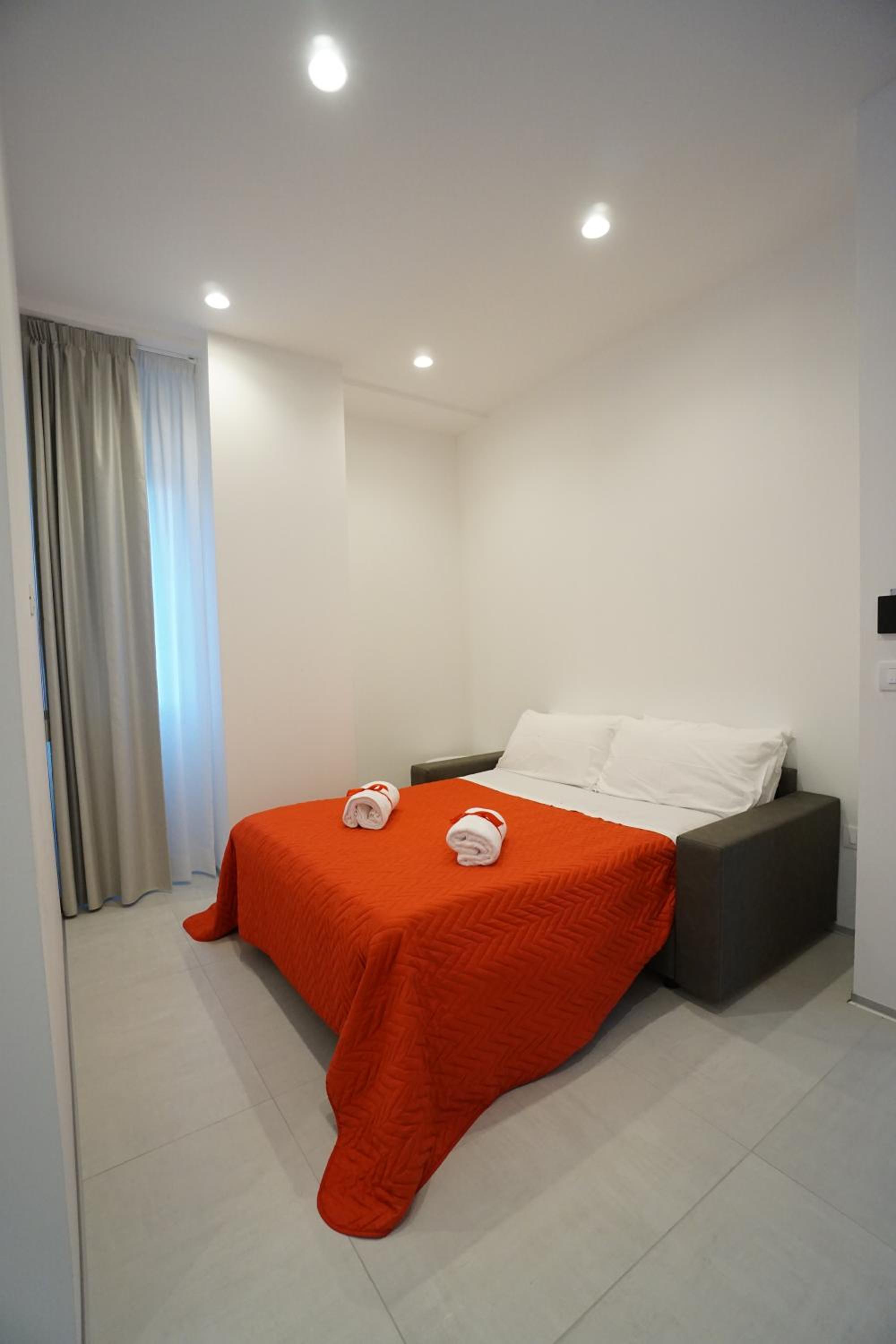 Deluxe Quadruple Room - Photo 11