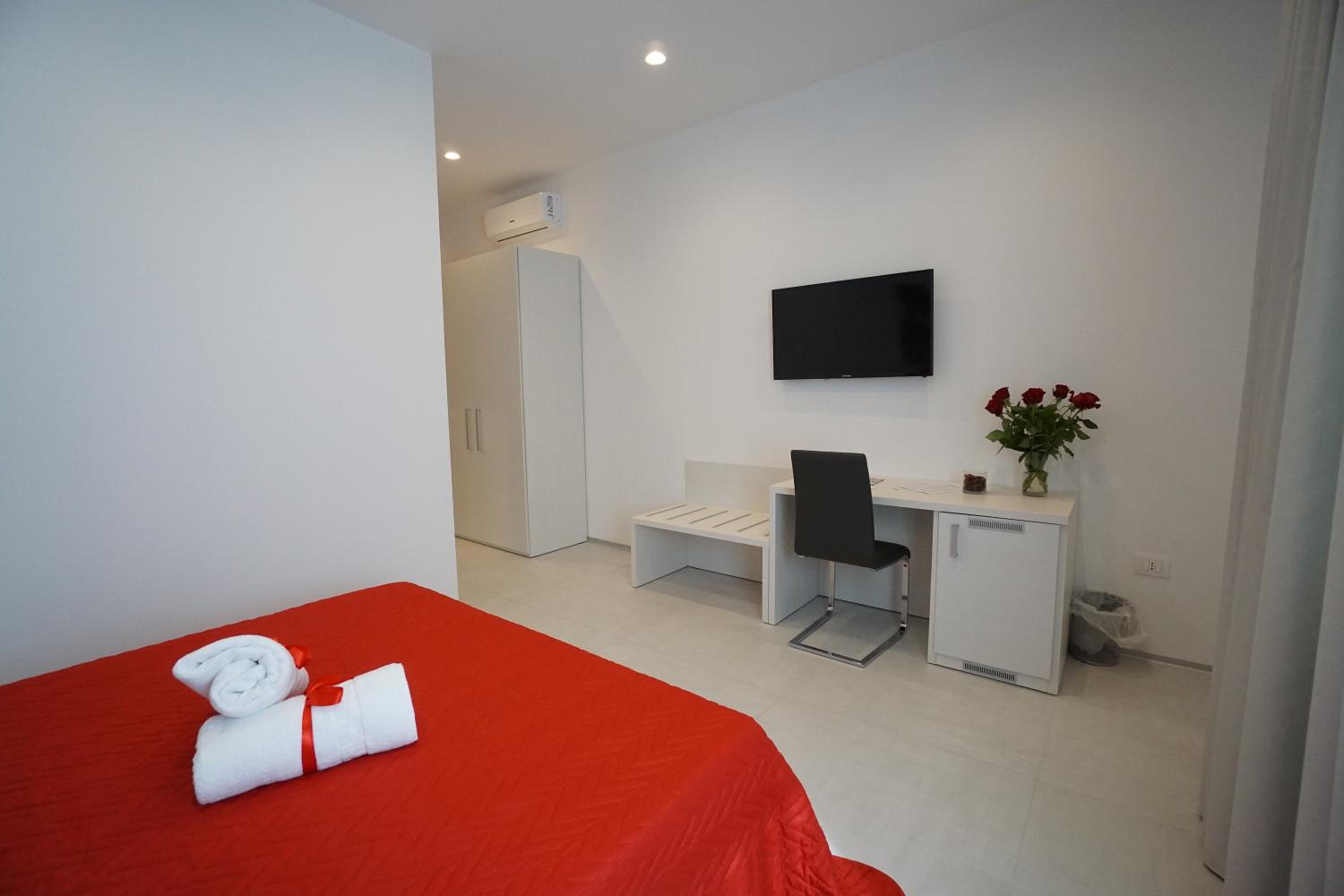 Deluxe Quadruple Room - Photo 10