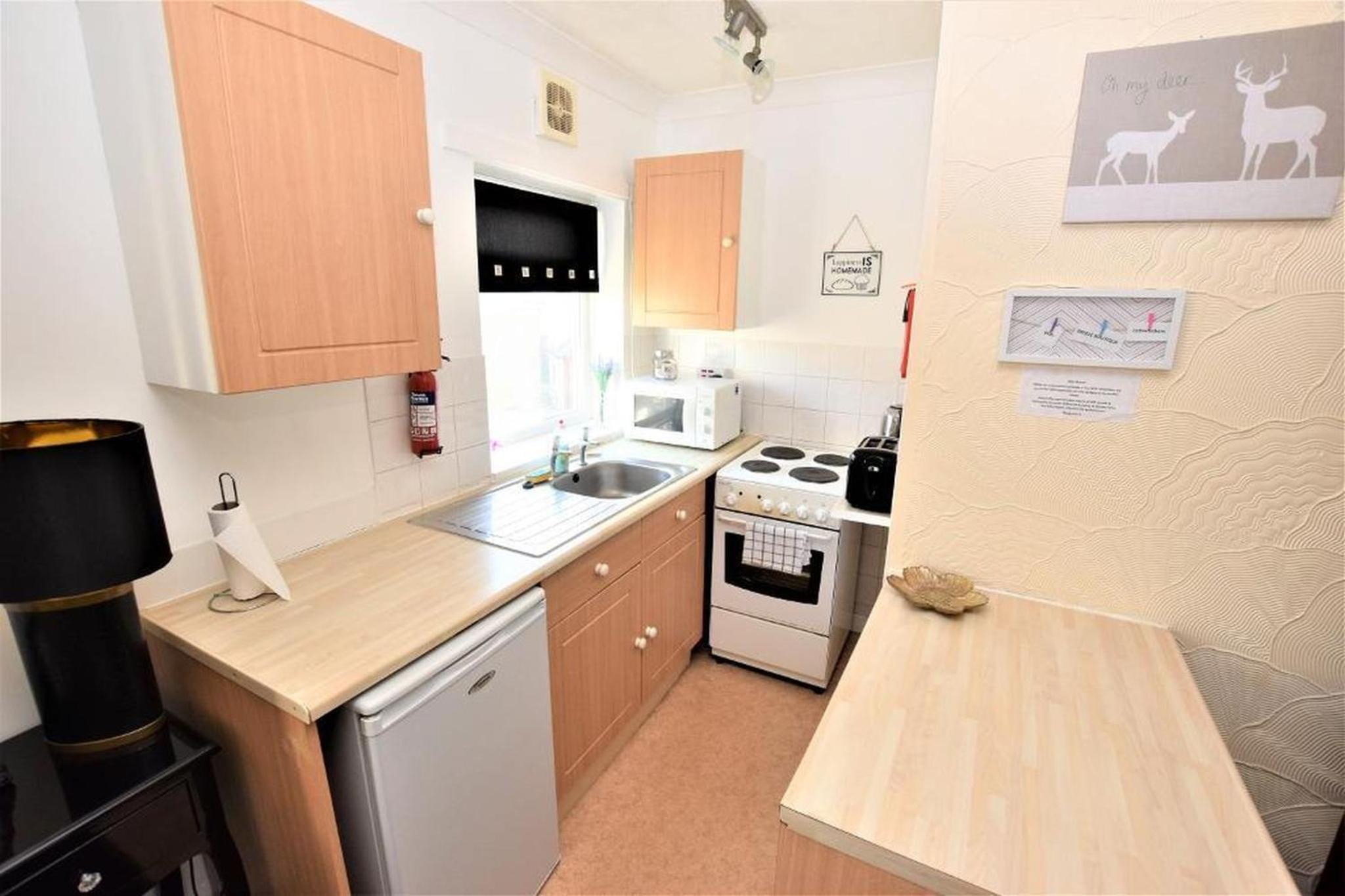 Comfort One-Bedroom Apartment top floor photo 2