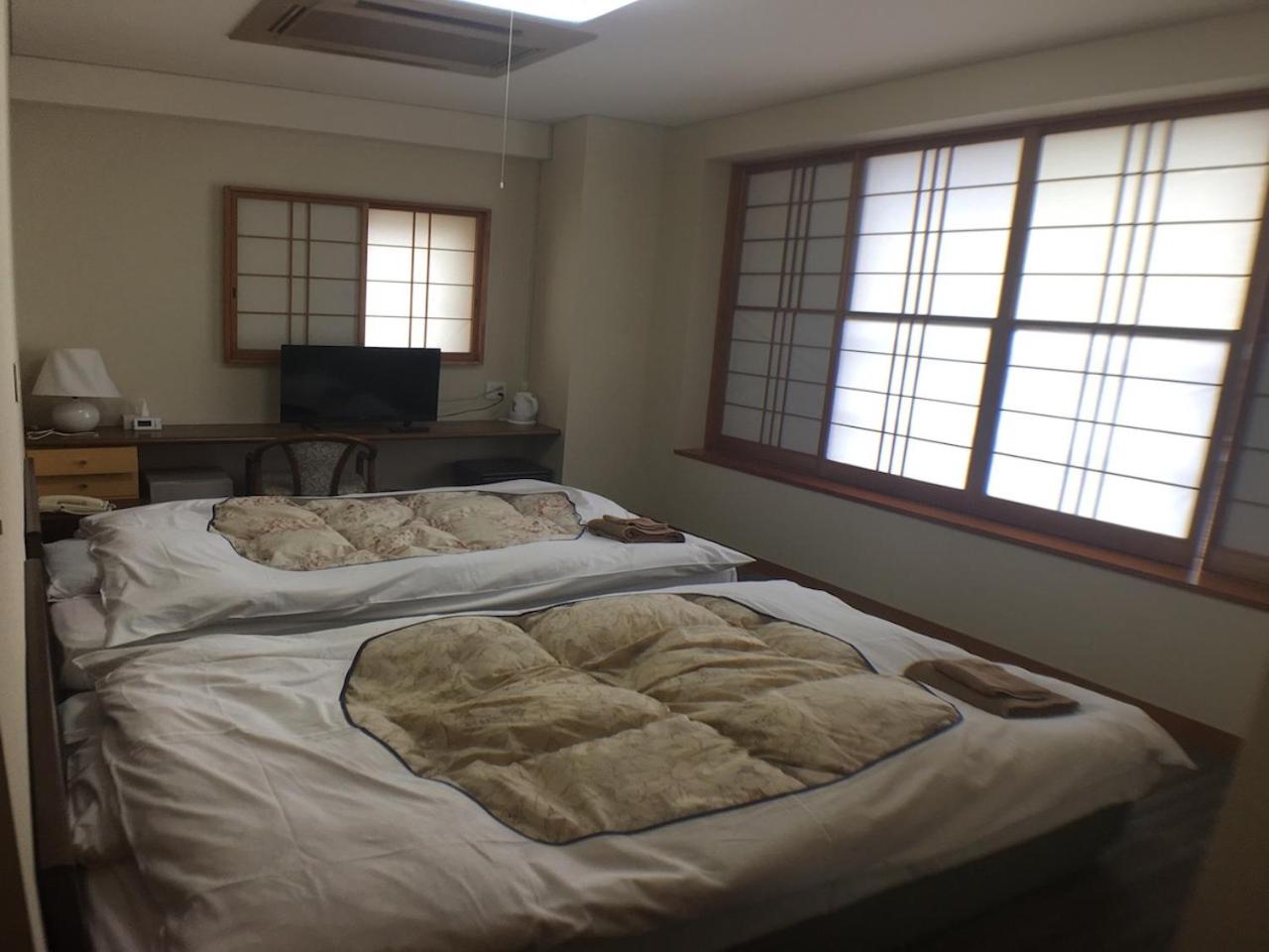 Standard Twin Room - Photo 1