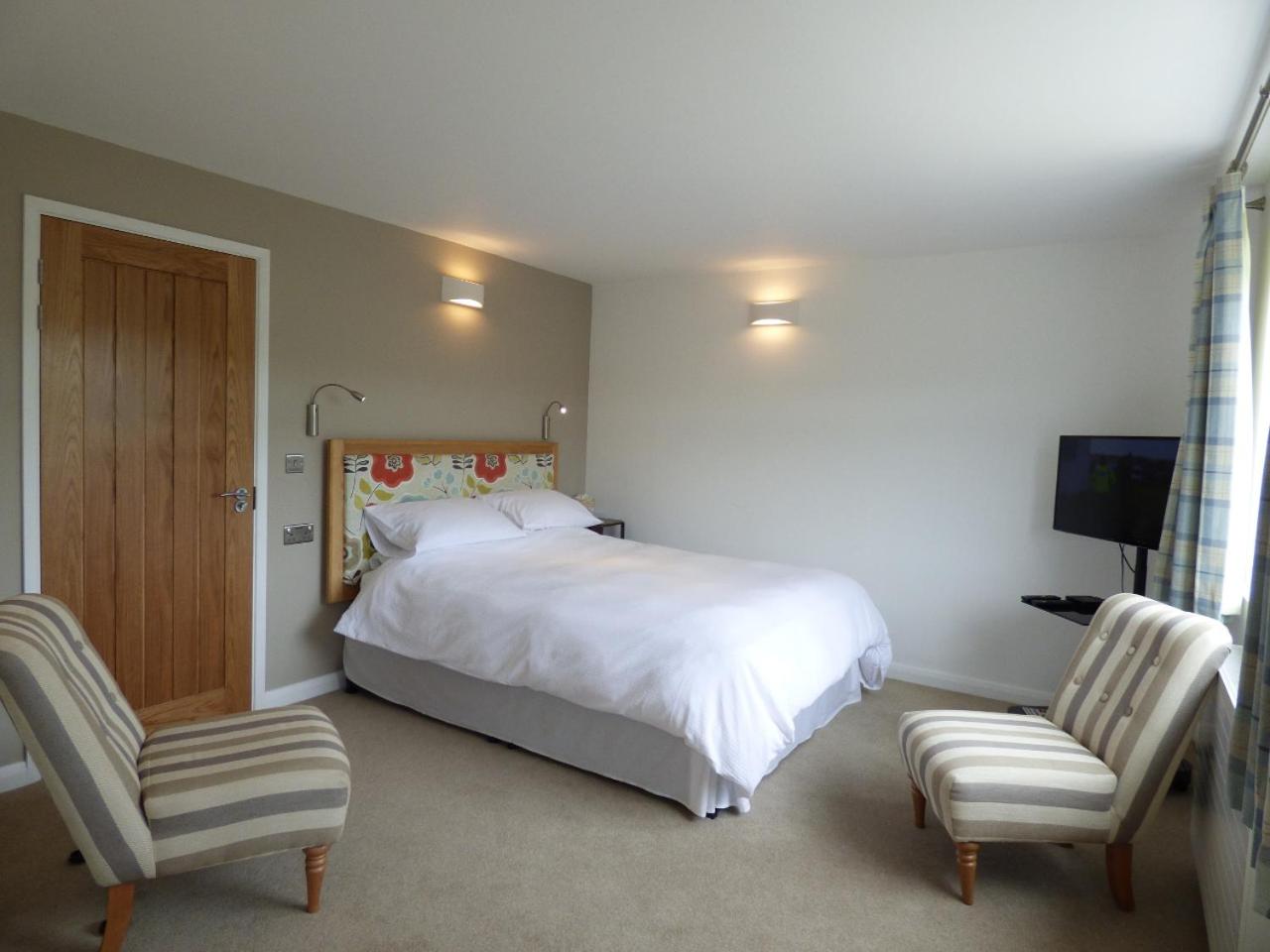 Deluxe King Room - Photo 1