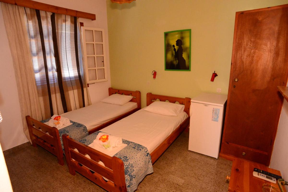 Standard Twin Room - Photo 11