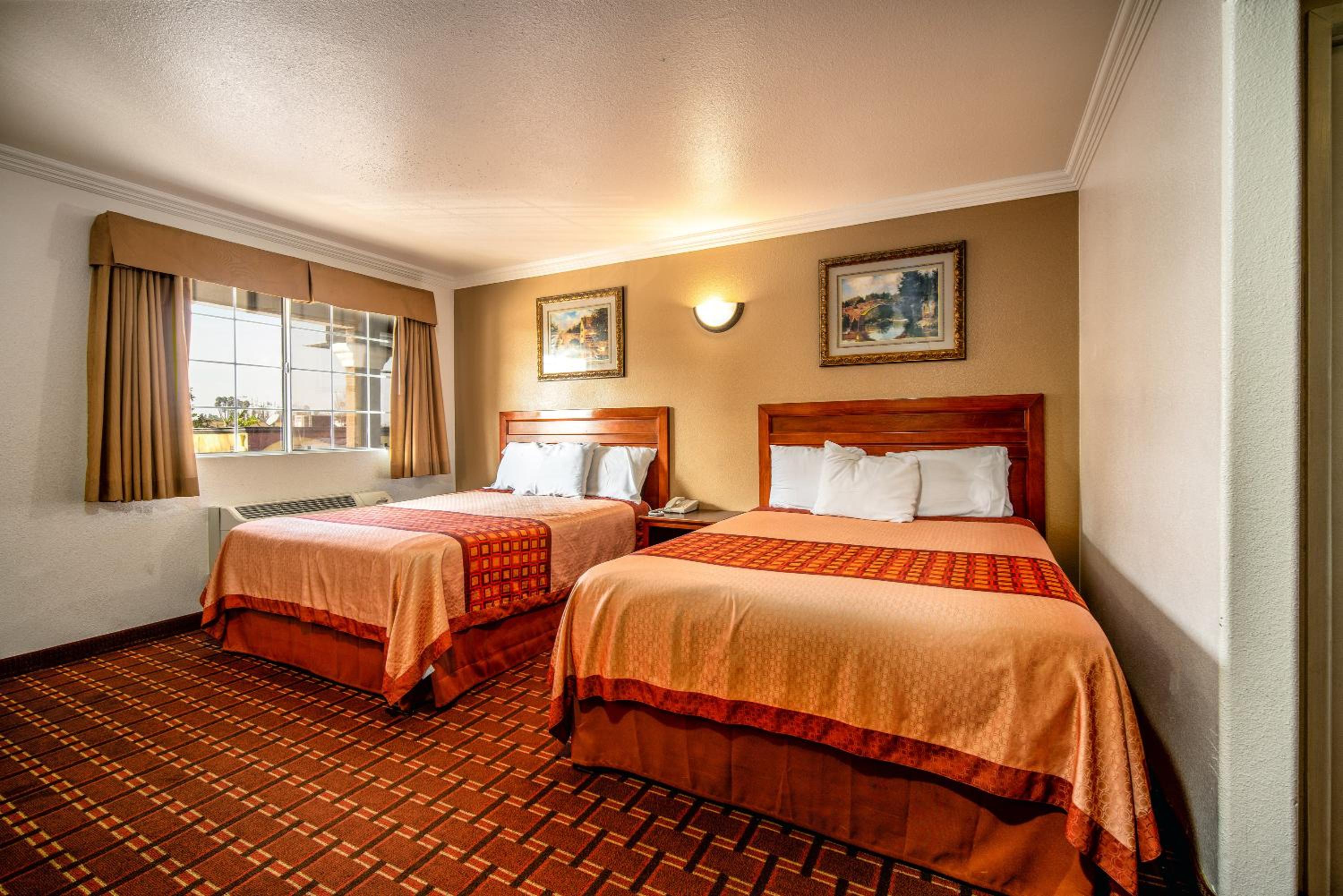 Queen Room with Two Queen Beds - Photo 1