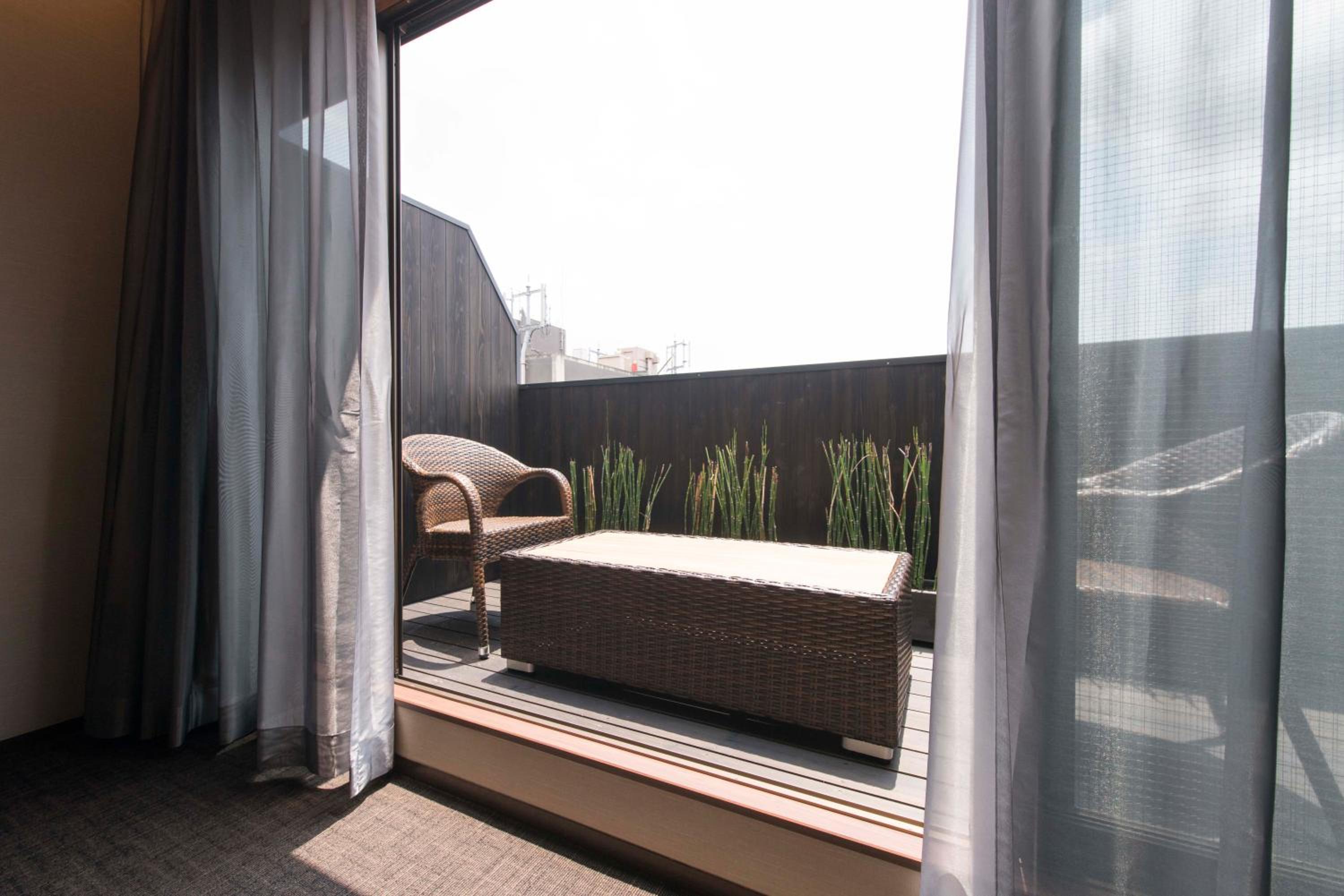 Twin Room with Balcony - Photo 11