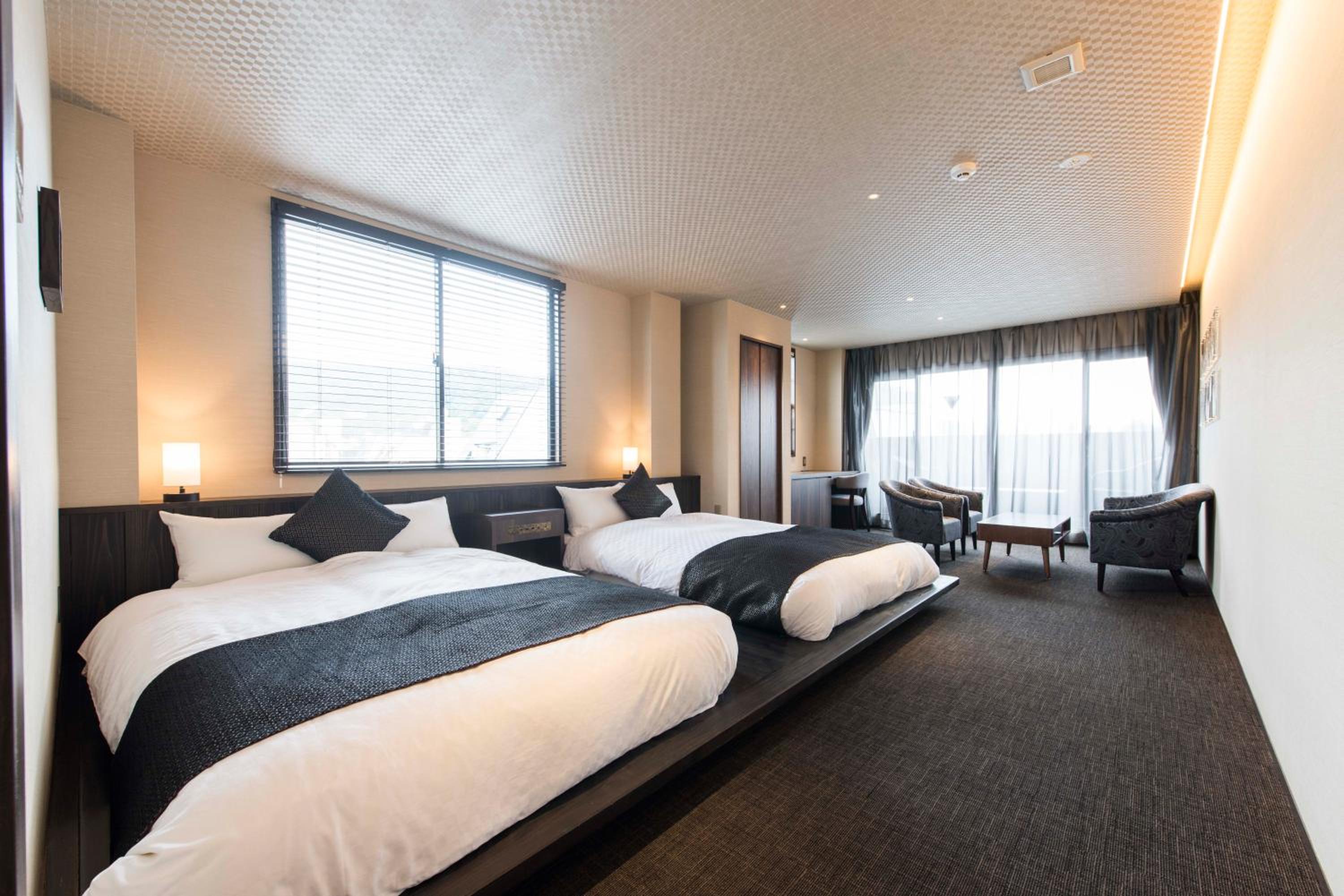 Twin Room with Balcony - Photo 1
