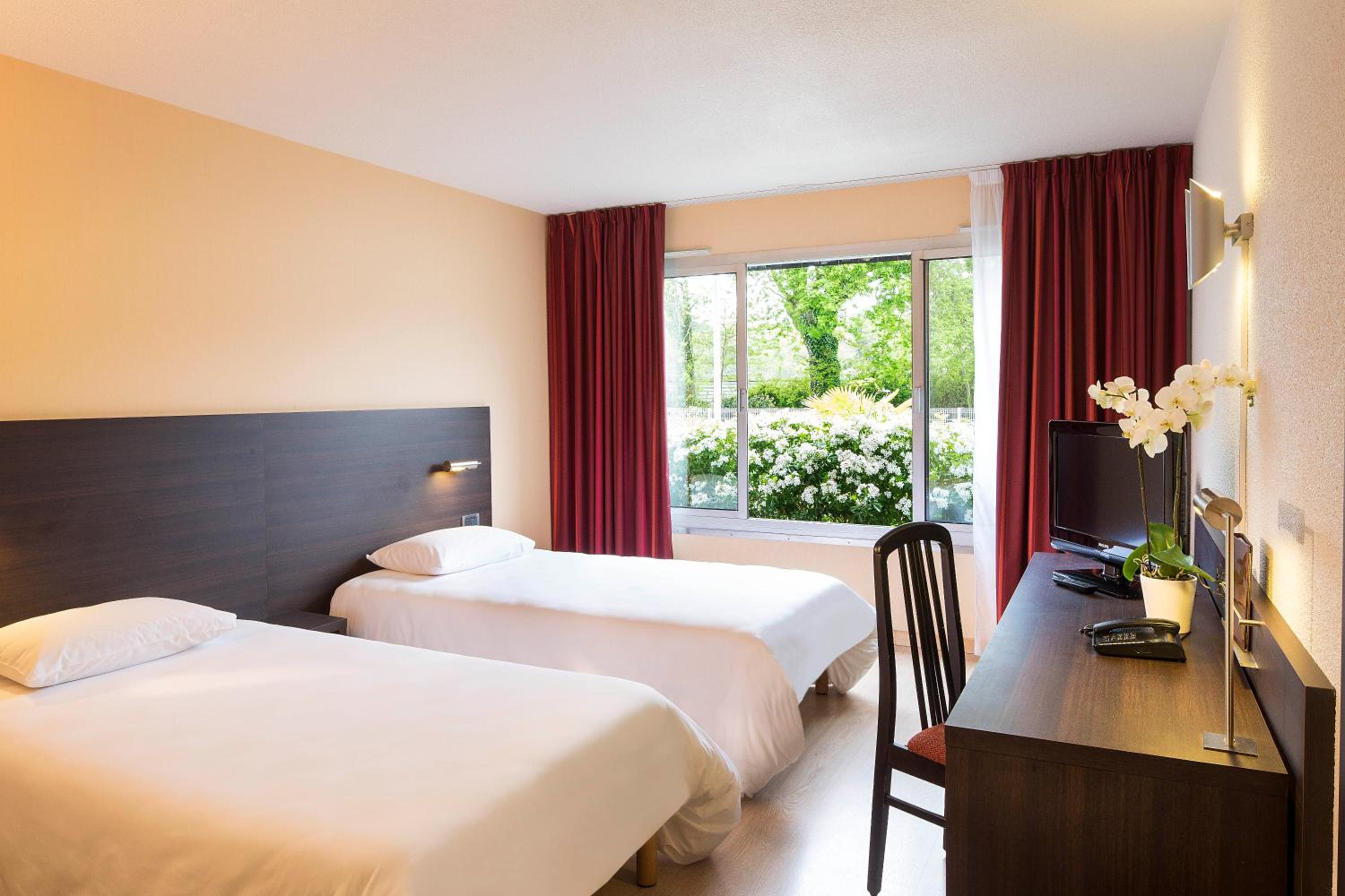 Twin Room - Photo 1