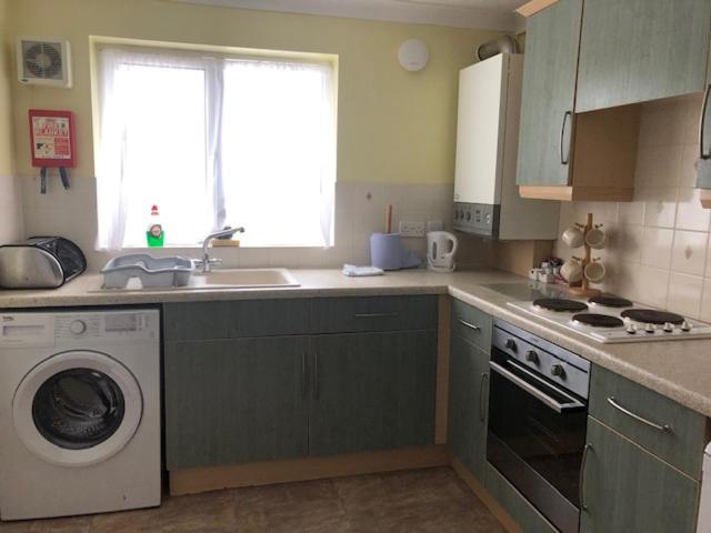 Three-Bedroom Apartment - Photo 2