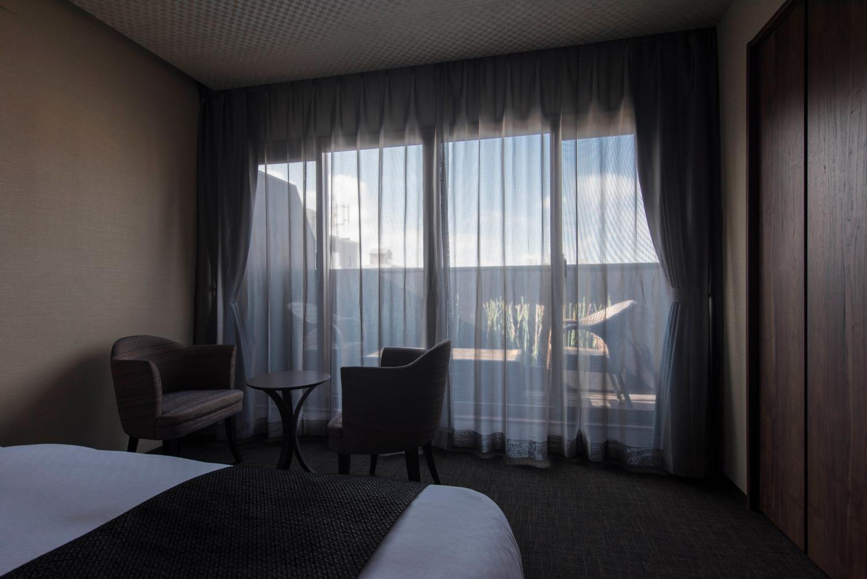 Quadruple Room with Balcony - Photo 8