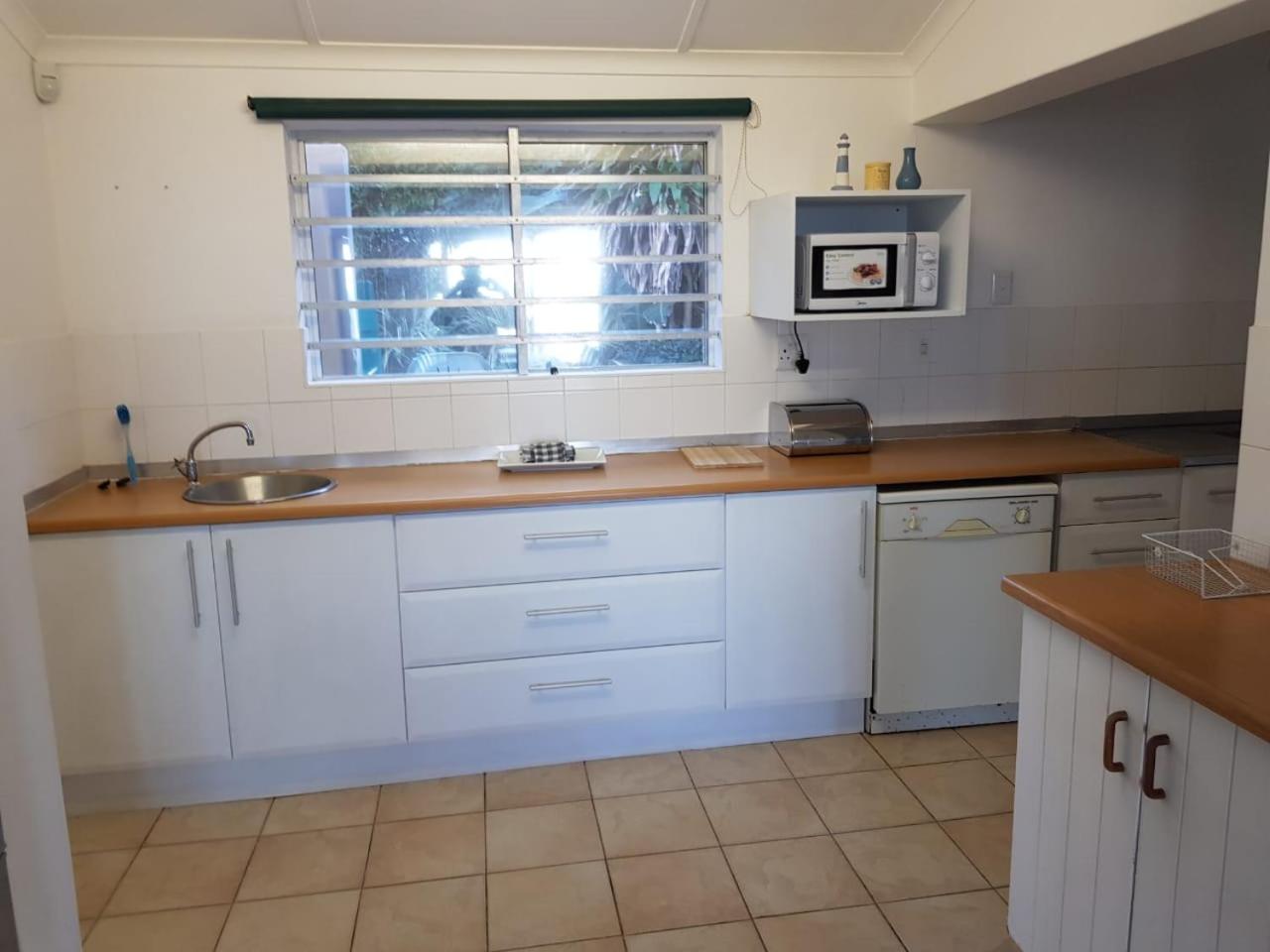 Four-Bedroom House - Photo 20