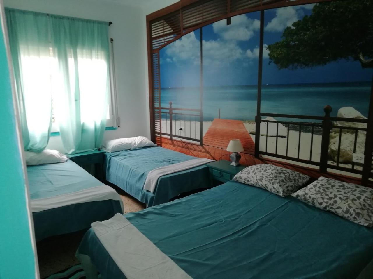 Habitación Cuádruple con Baño Privado