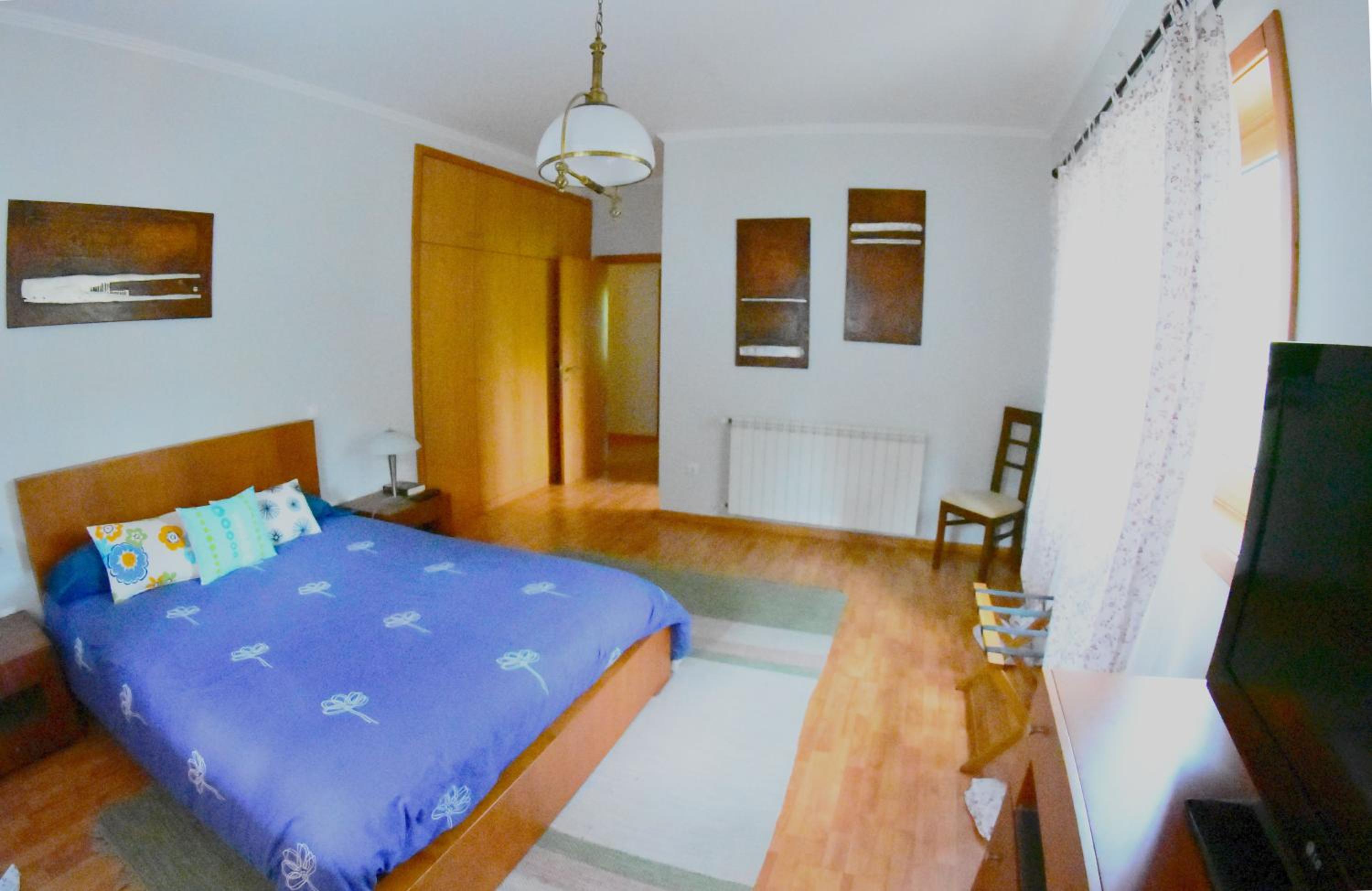 Three-Bedroom House - Photo 28