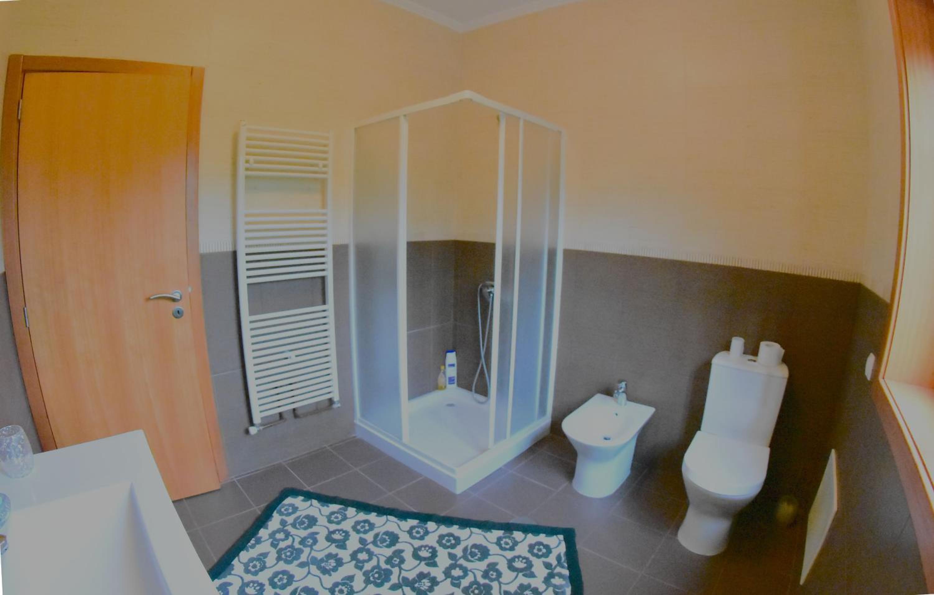Three-Bedroom House - Photo 23