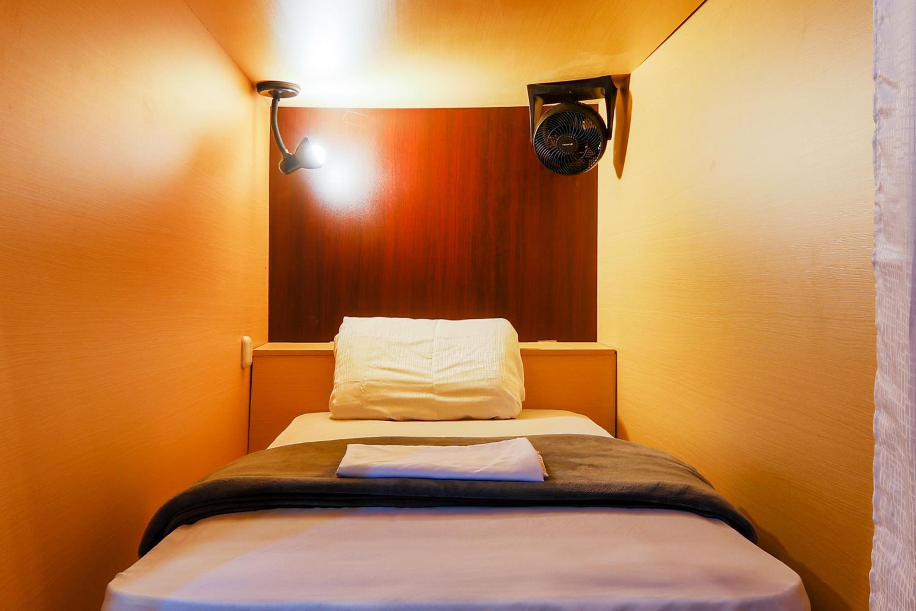 Capsule Bed in 14-Bed Mixed Dormitory Room with Shared Bathroom