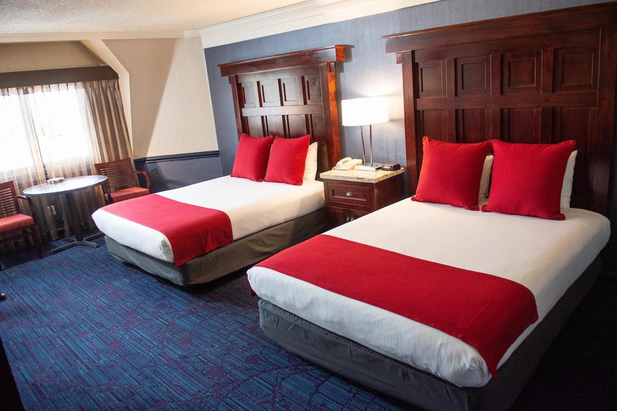 Deluxe Queen Room with Two Queen Beds - Non-Smoking photo 1