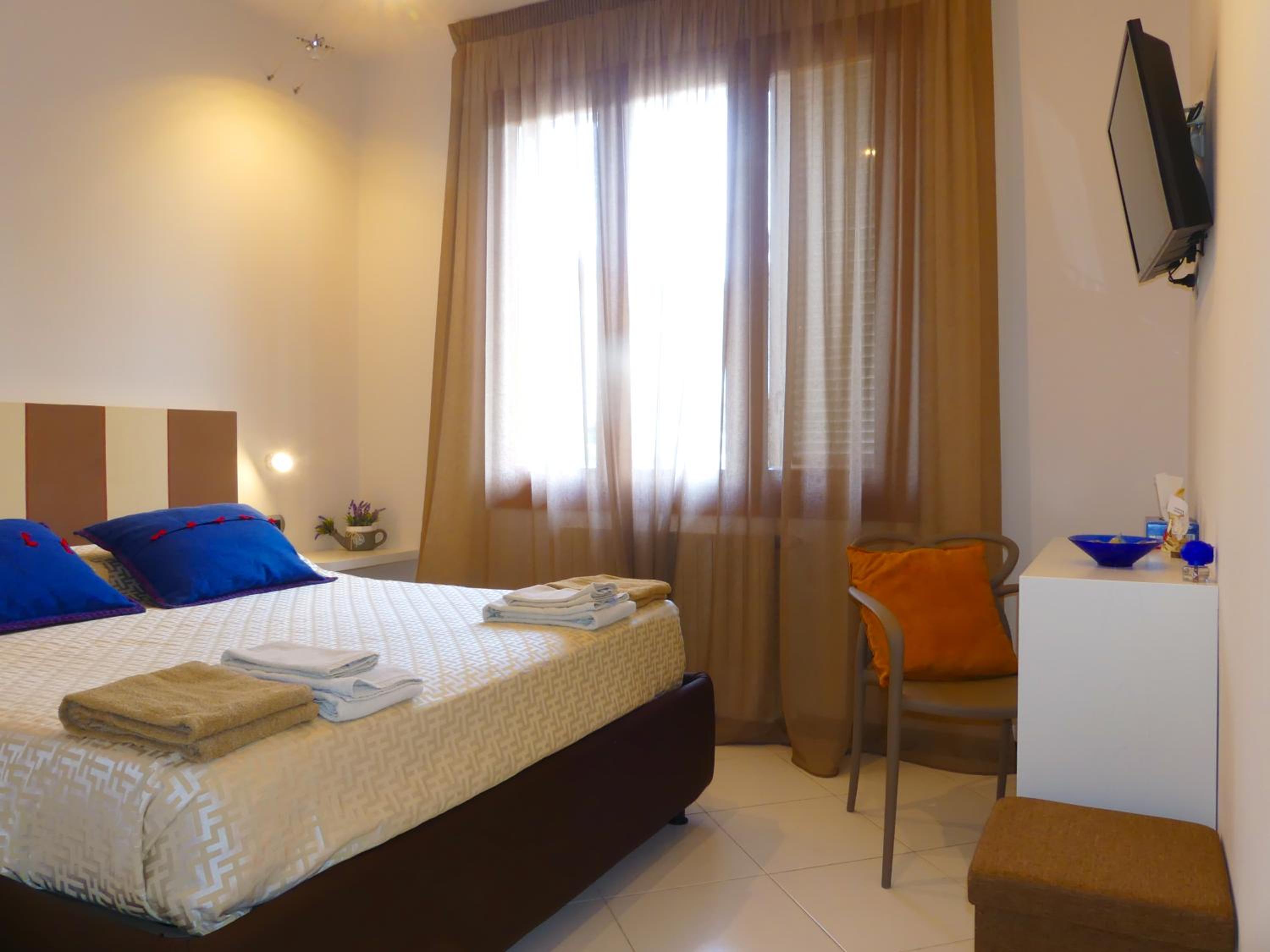 Deluxe Quadruple Room - Photo 6