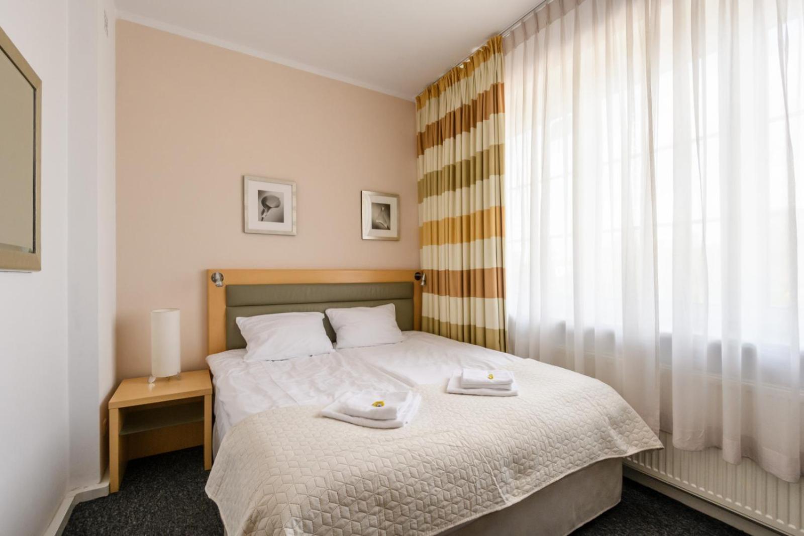 Queen Room with Shared Bathroom