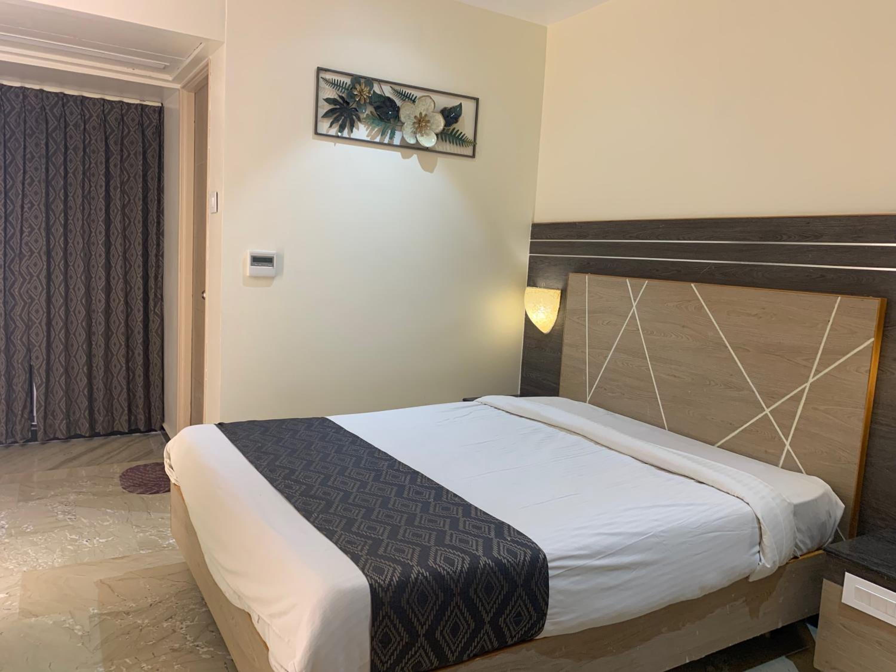 Deluxe Room - Photo 1