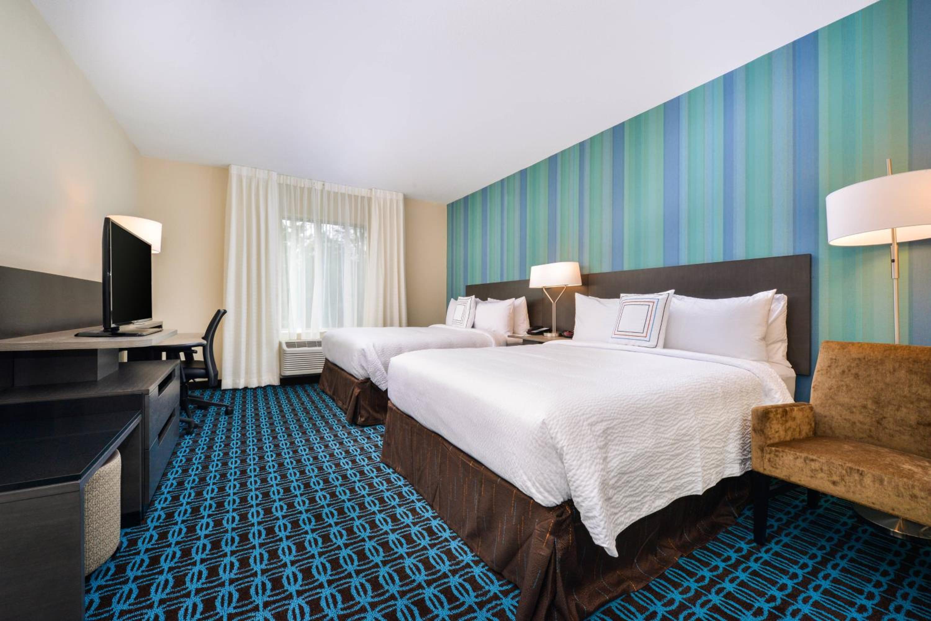 Queen Room with Two Queen Beds - Hearing Accessible photo 1