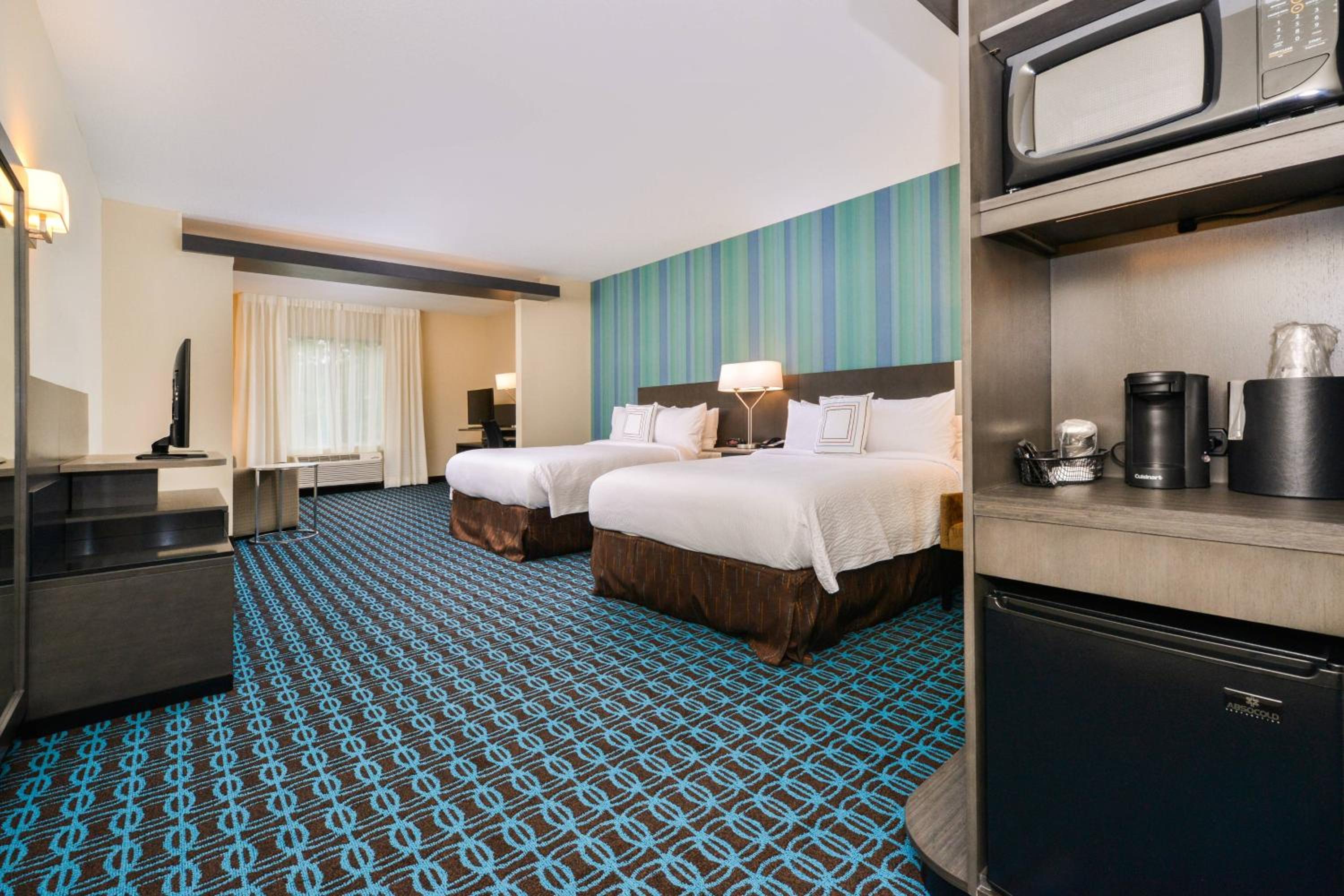 Queen Room with Two Queen Beds and Sofa Bed - Hearing Accessible photo 1